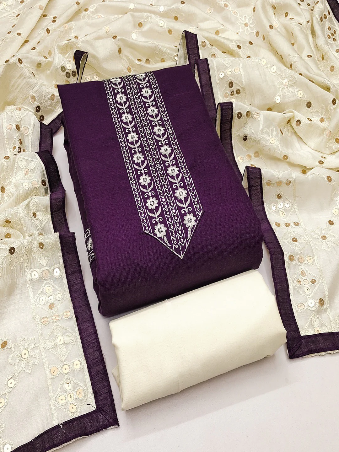 Elegant Purple Cotton Blend Dress Material Adorned With Floral Embroidery & Delicate Sequins Work