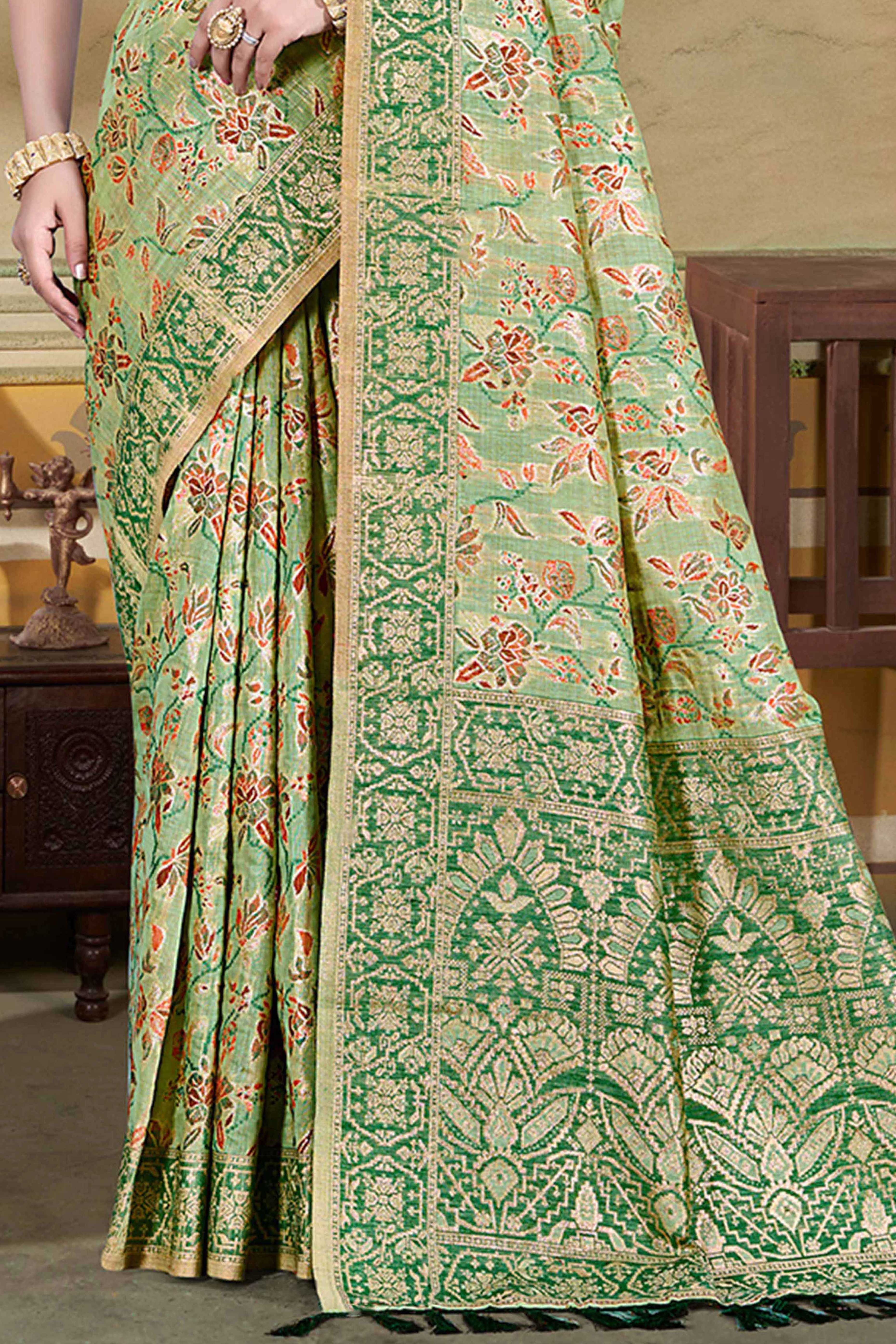 Alluring Green Floral Zari Weaving Cotton Silk Saree With Graceful Tassel Pallu - Image 4