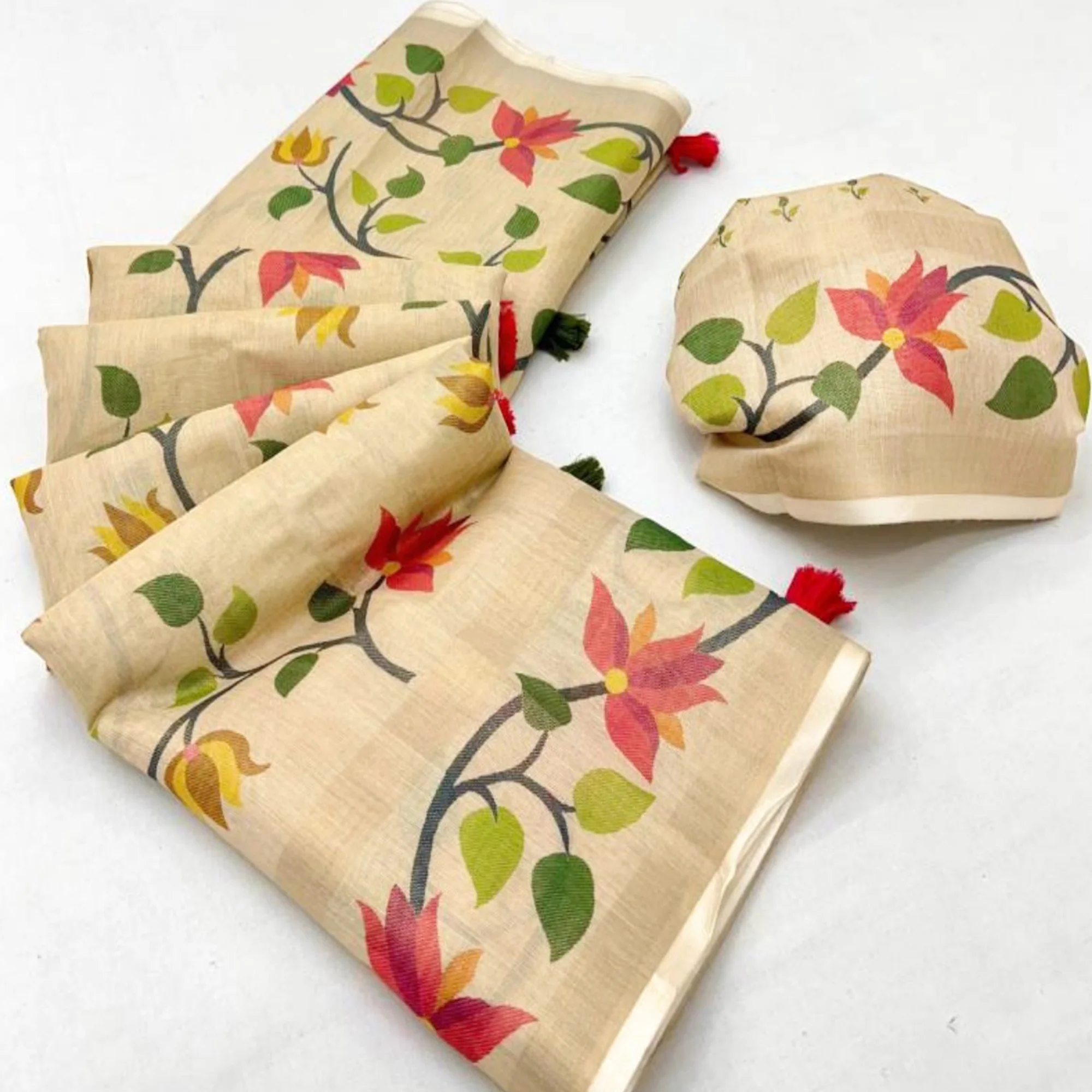 Beige Floral Printed Tissue Cotton Silk Saree Enhanced with a Classic Zari Weaving Border