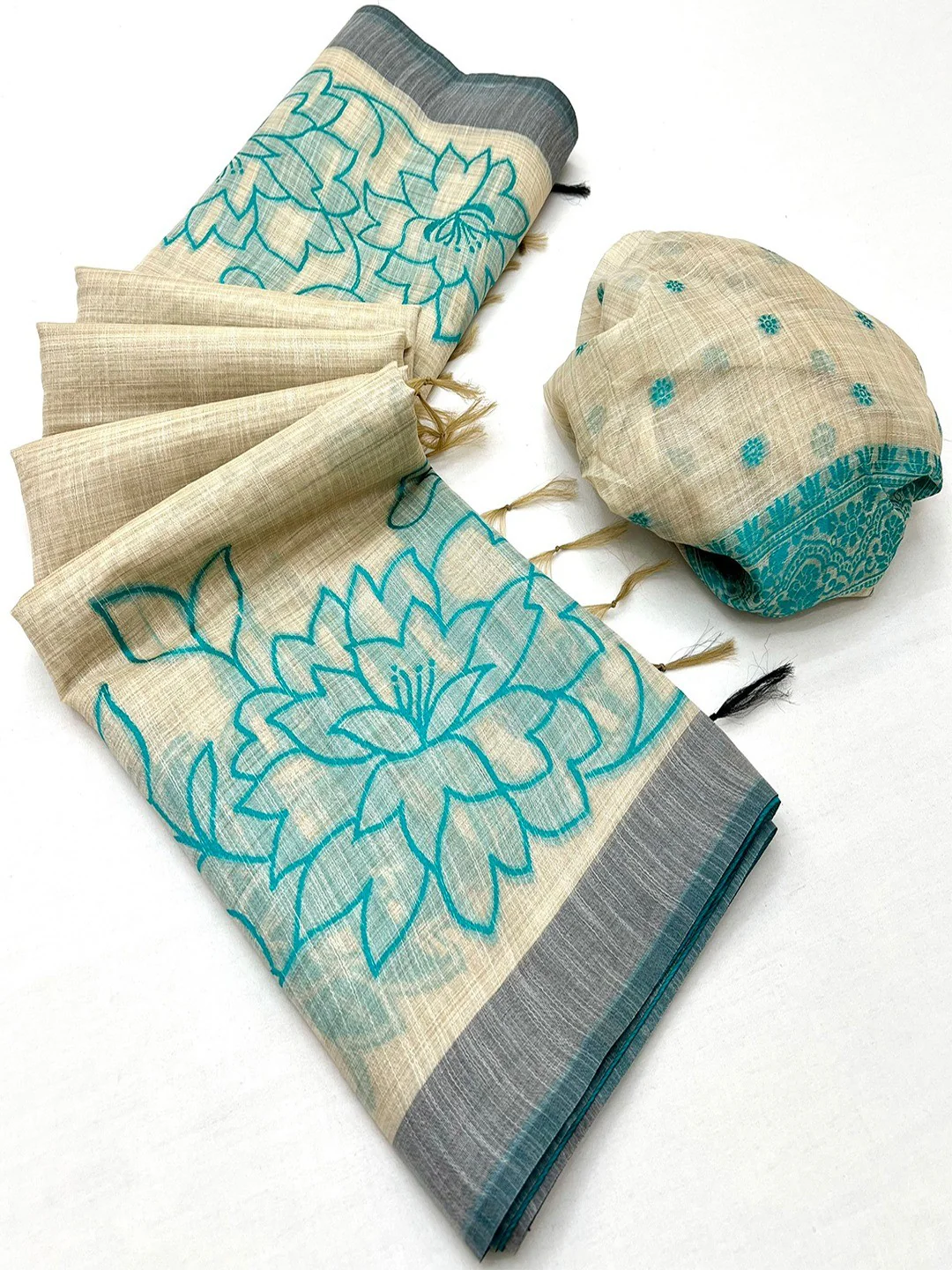 Beige Woven Cotton Blend Saree Featuring Turquoise Floral Pattern In Jamdani Style
