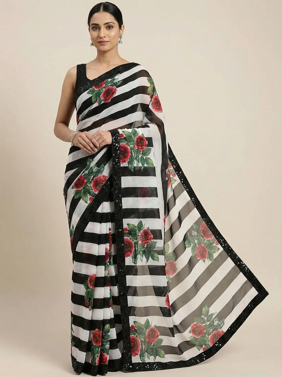 Black Georgette Saree Highlighted with Striped Design and a Delicate Sequin Border