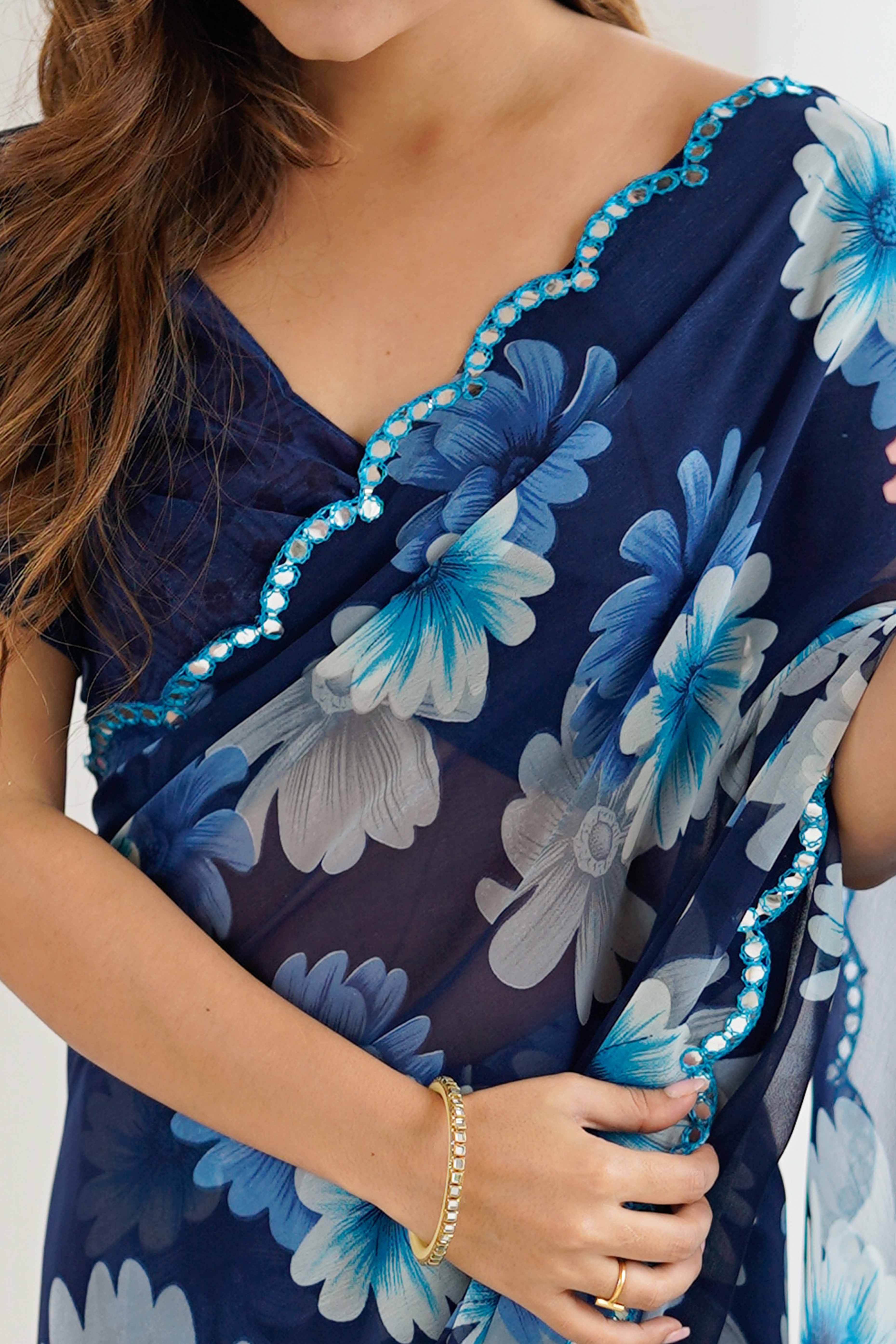 Blue Georgette Saree Featuring Floral Prints & Shimmering Mirror Work Border - Image 2