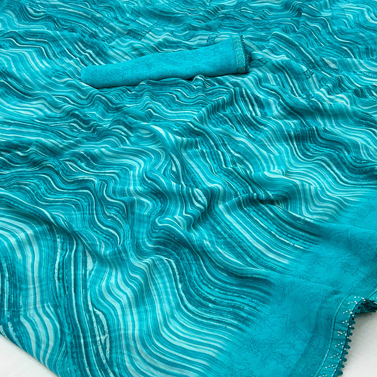 Blue Printed Georgette Saree With Fancy Lace Border - Image 2