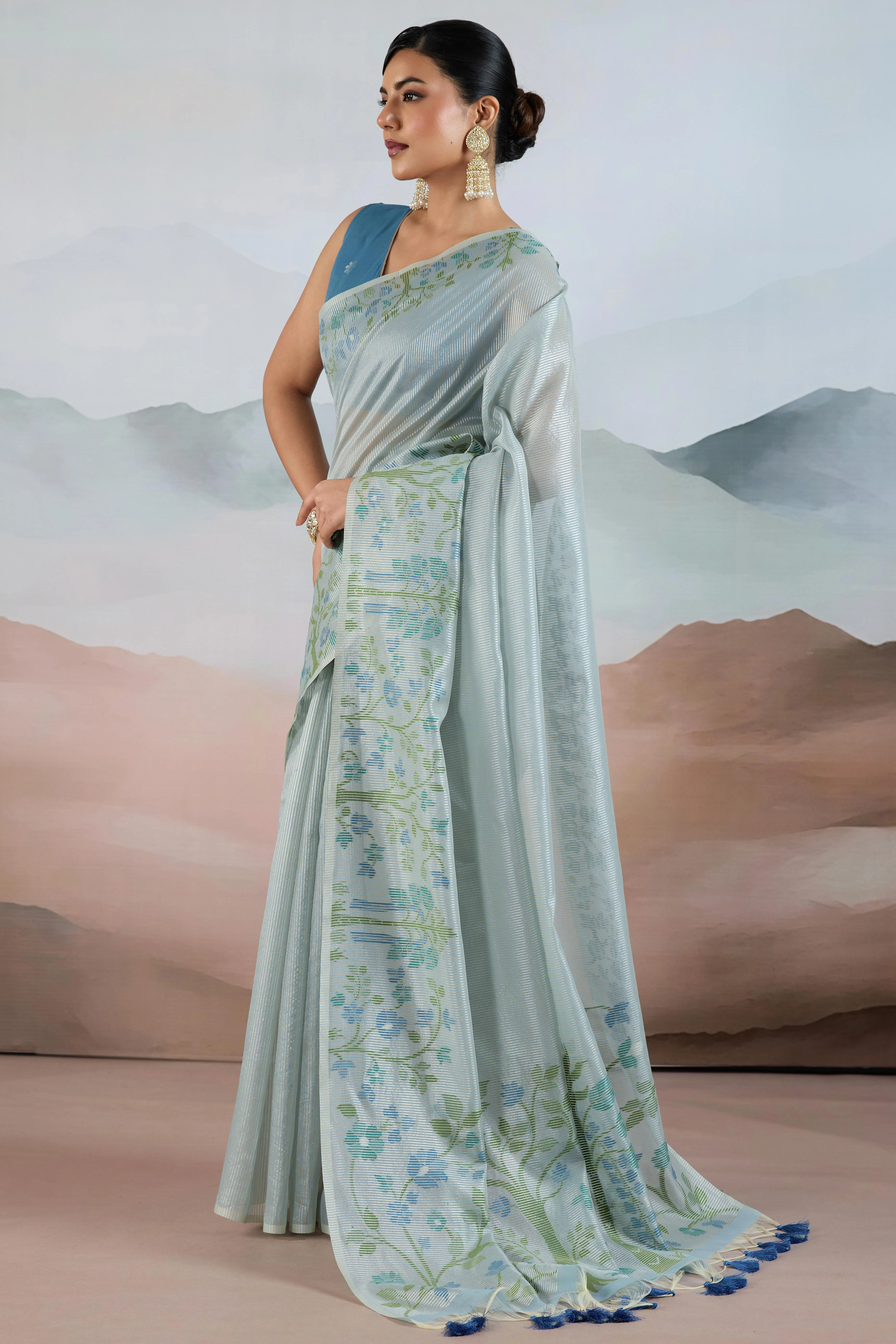 Blue Tissue Silk Saree Showcasing Floral & Striped Weaving With Tassel Adornment - Image 3