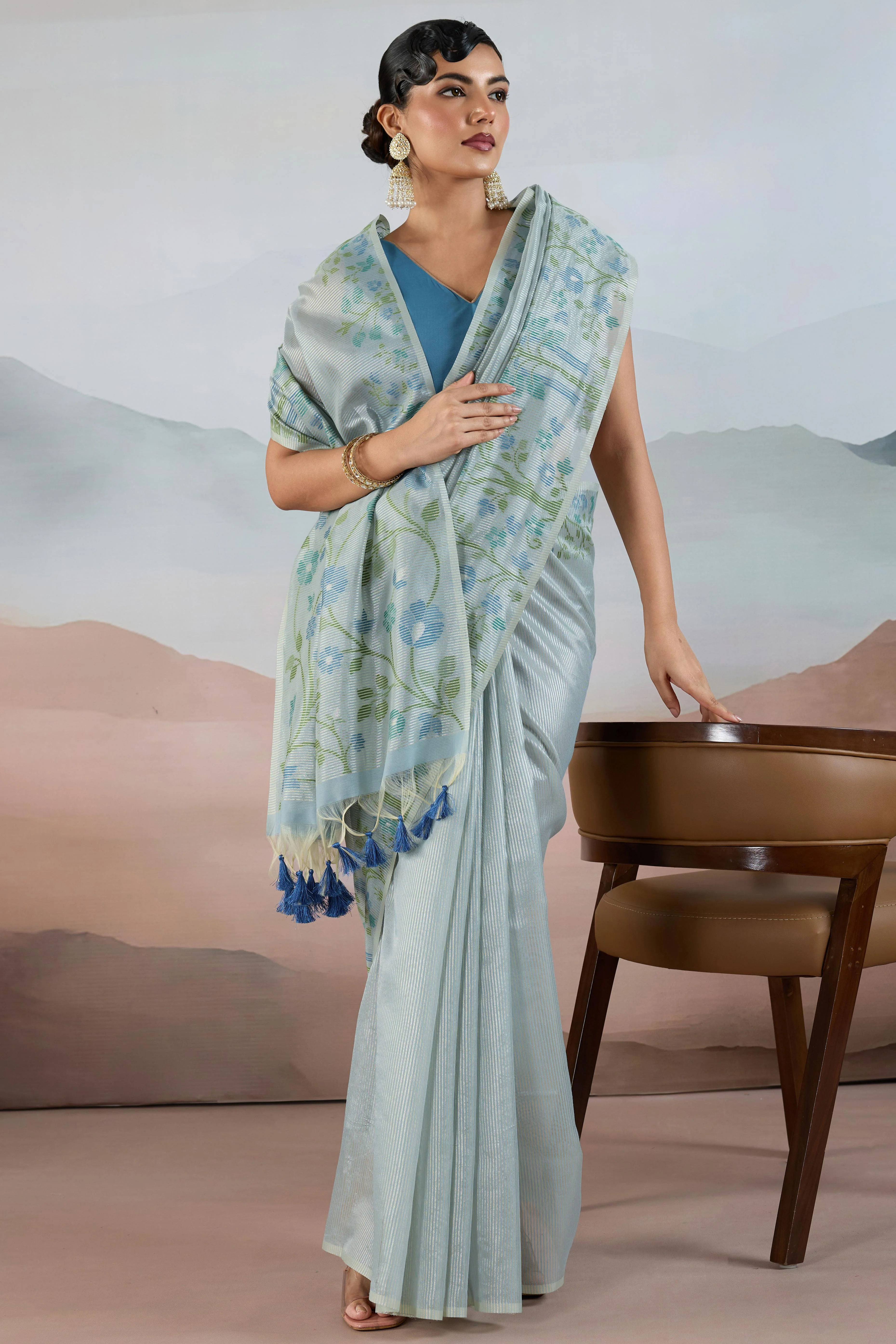 Blue Tissue Silk Saree Showcasing Floral & Striped Weaving With Tassel Adornment - Image 4