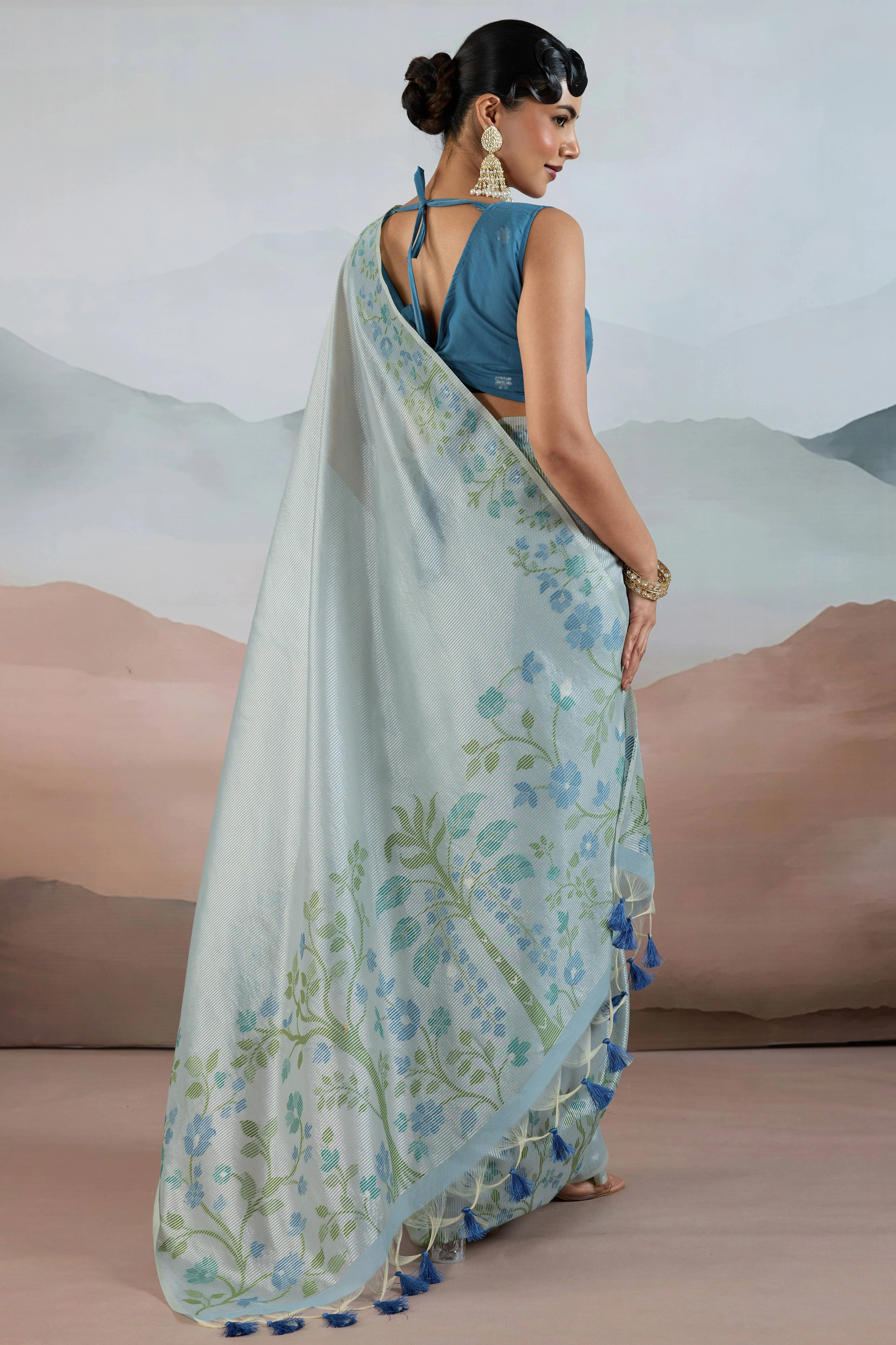 Blue Tissue Silk Saree Showcasing Floral & Striped Weaving With Tassel Adornment - Image 5