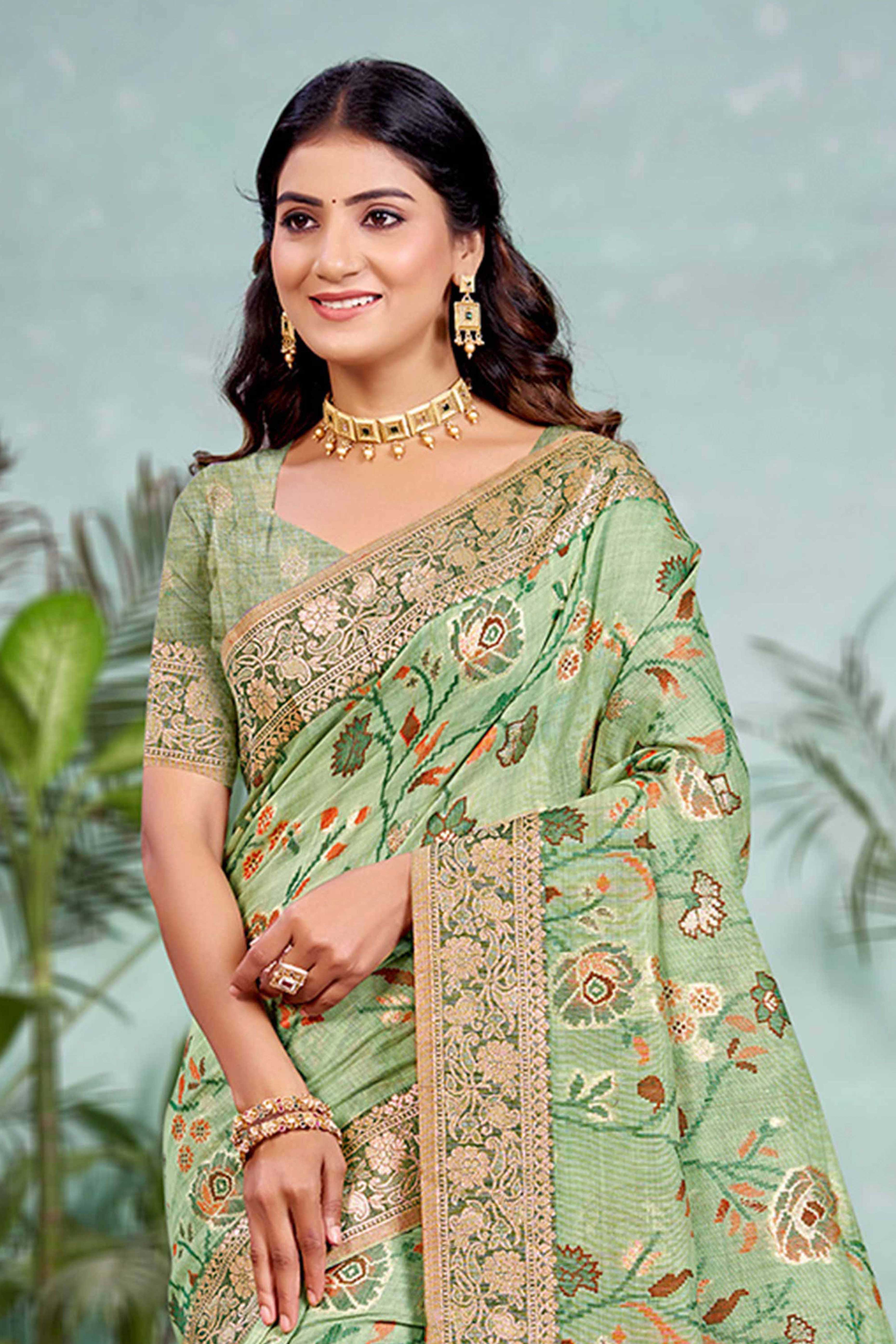 Captivating Green Floral Zari Weaving Cotton Silk Saree Accented With Tassel Pallu - Image 3