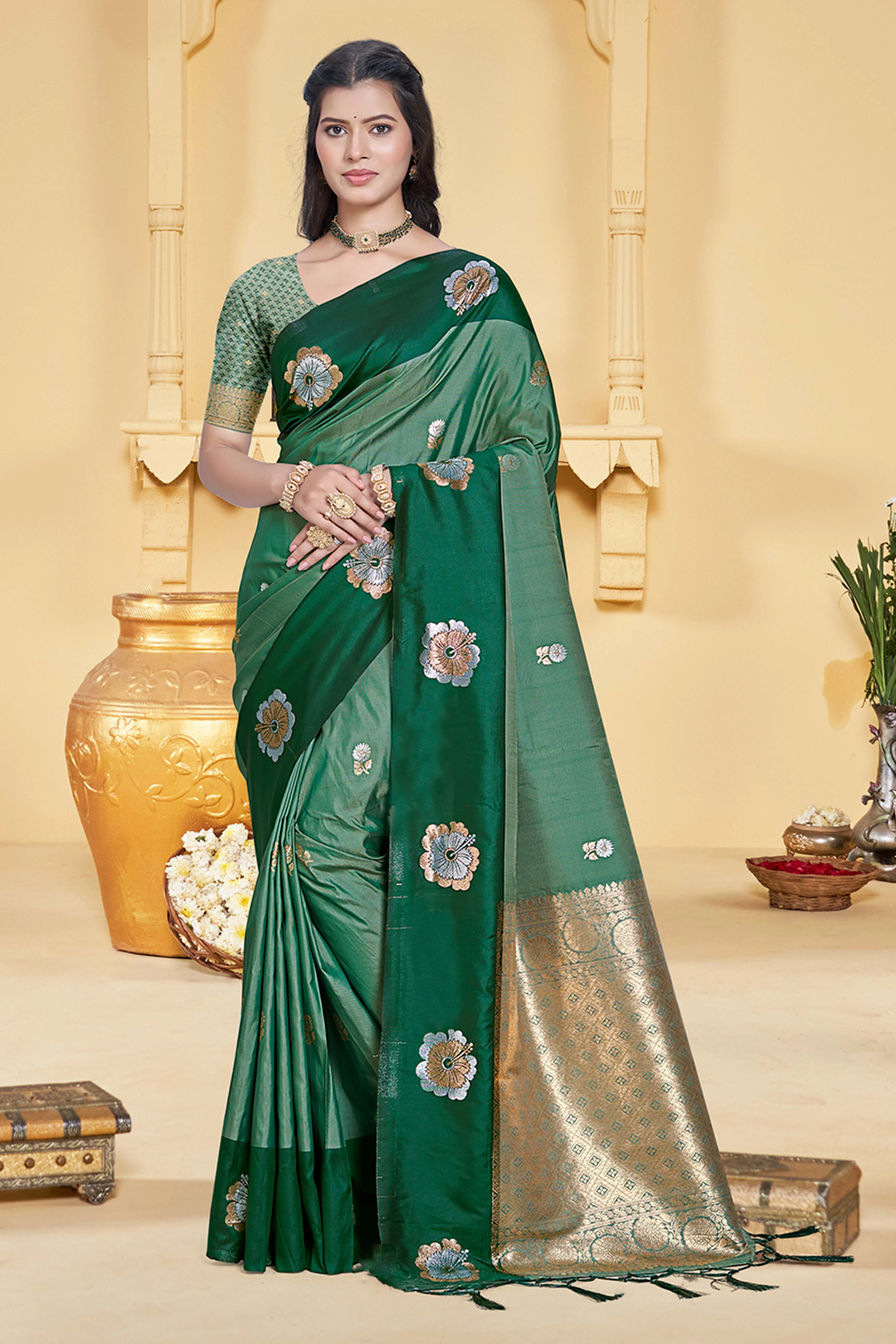 Charming Green Floral Zari Weaving Silk Blend Saree Enhanced With Stylish Tassel Pallu