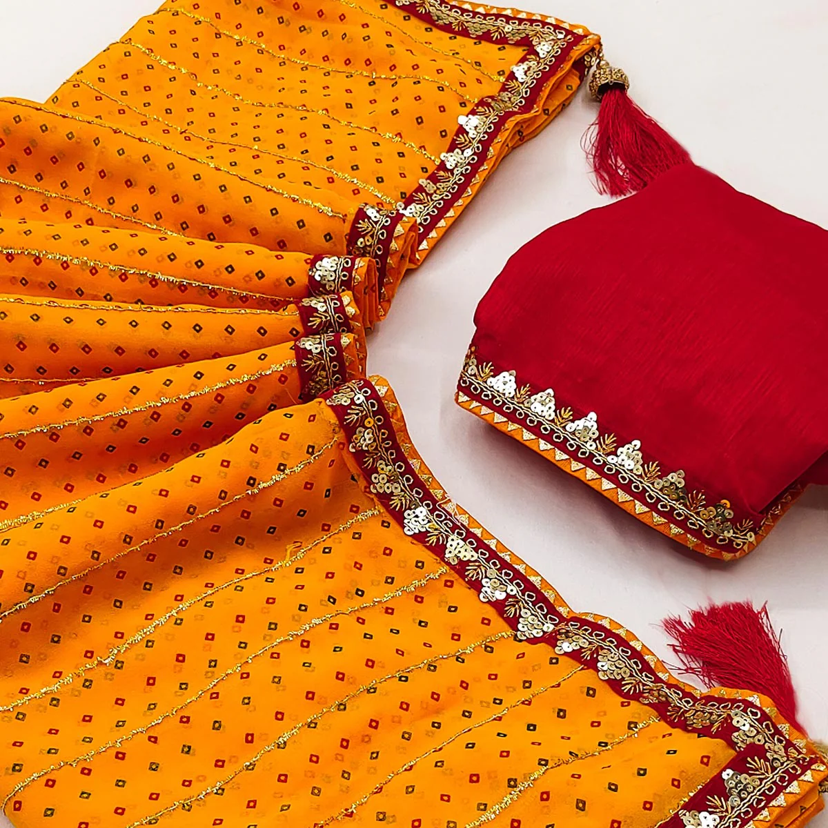 Charming Mustard Bandhani Printed Georgette Saree With Glittering Sequins & Zari Border - Image 2