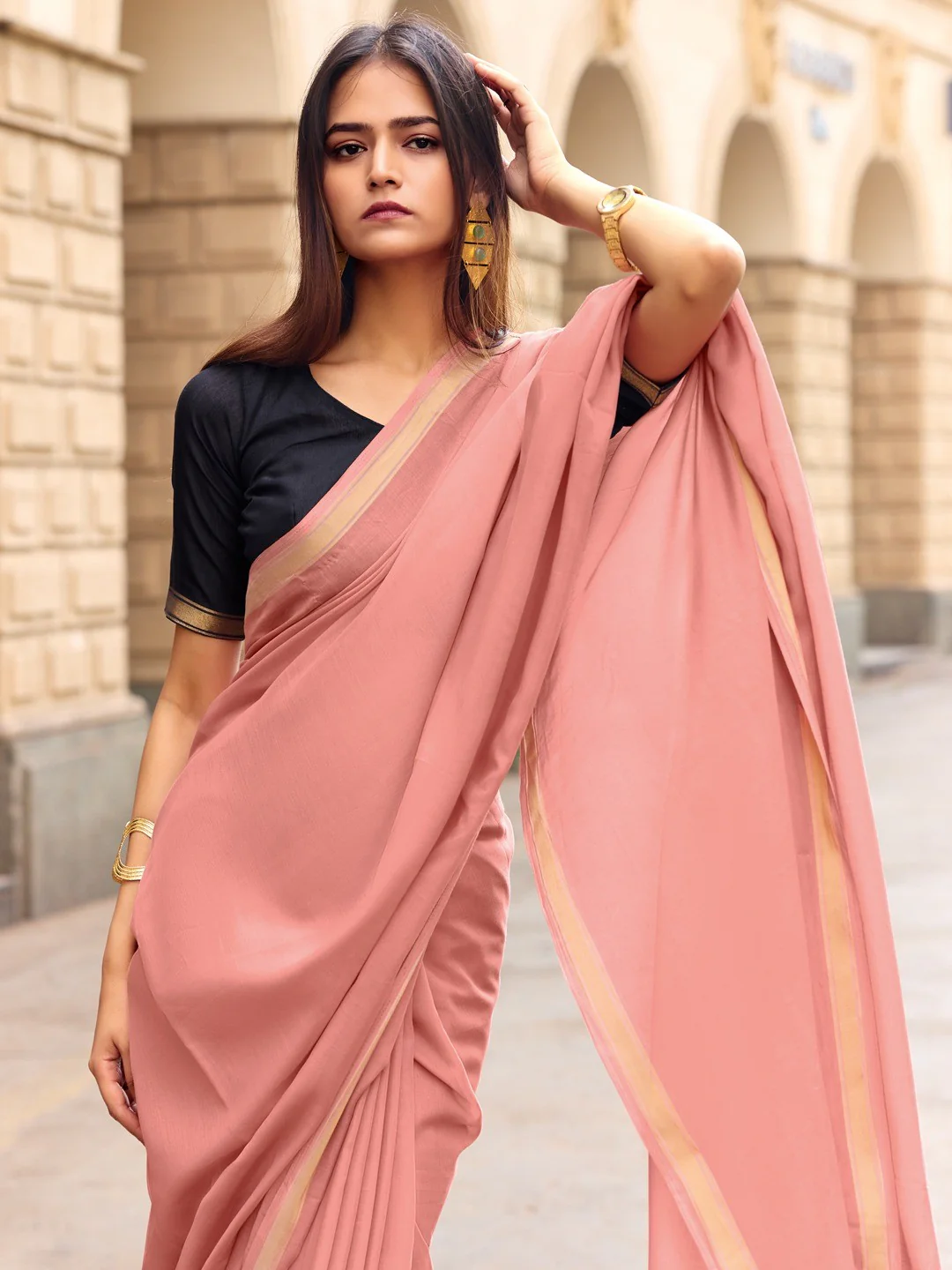 Charming Peach Solid Mulmul Cotton Saree Highlighted By Zari Weaving Border & Tassel Pallu - Image 2