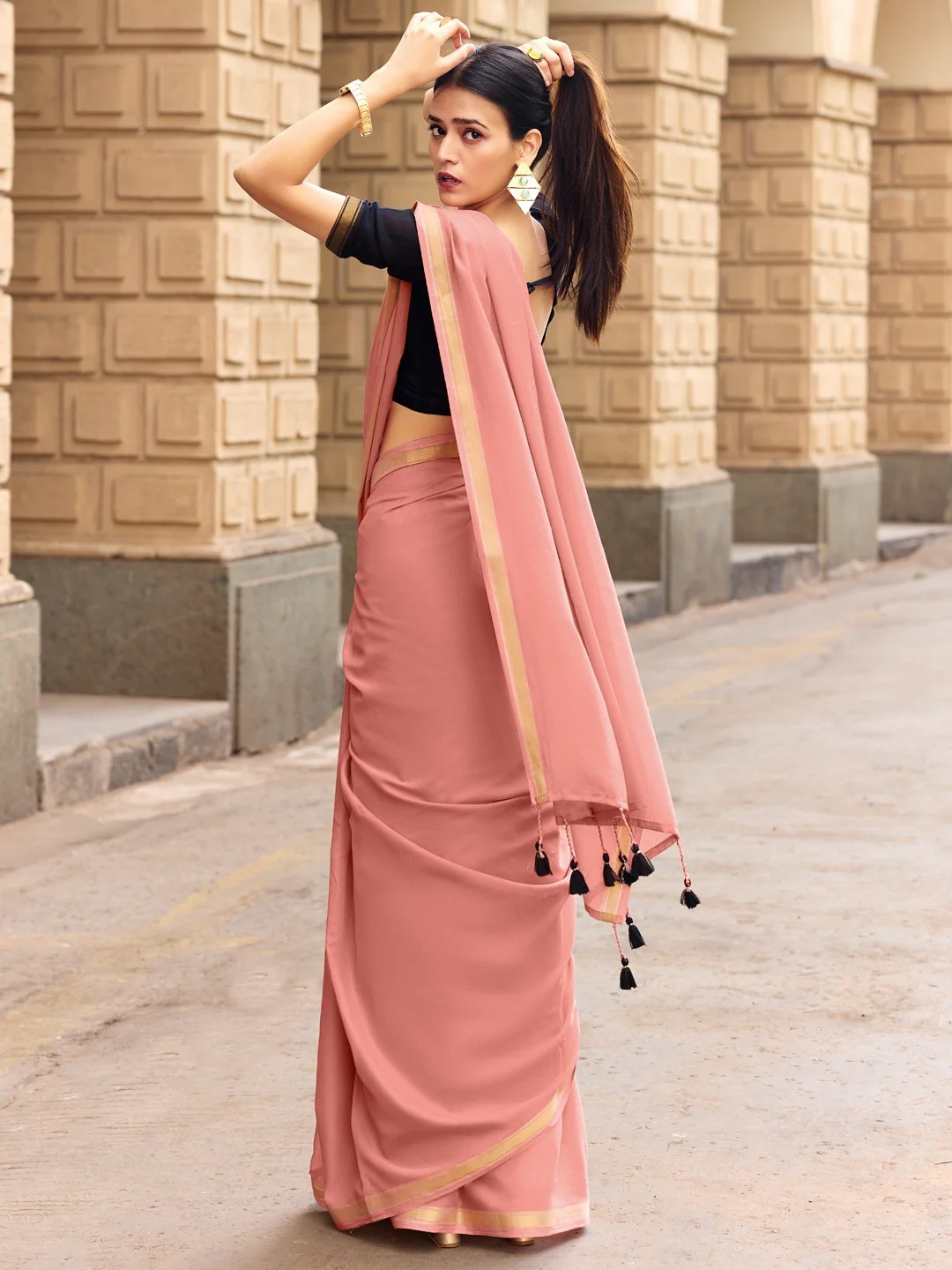 Charming Peach Solid Mulmul Cotton Saree Highlighted By Zari Weaving Border & Tassel Pallu - Image 3