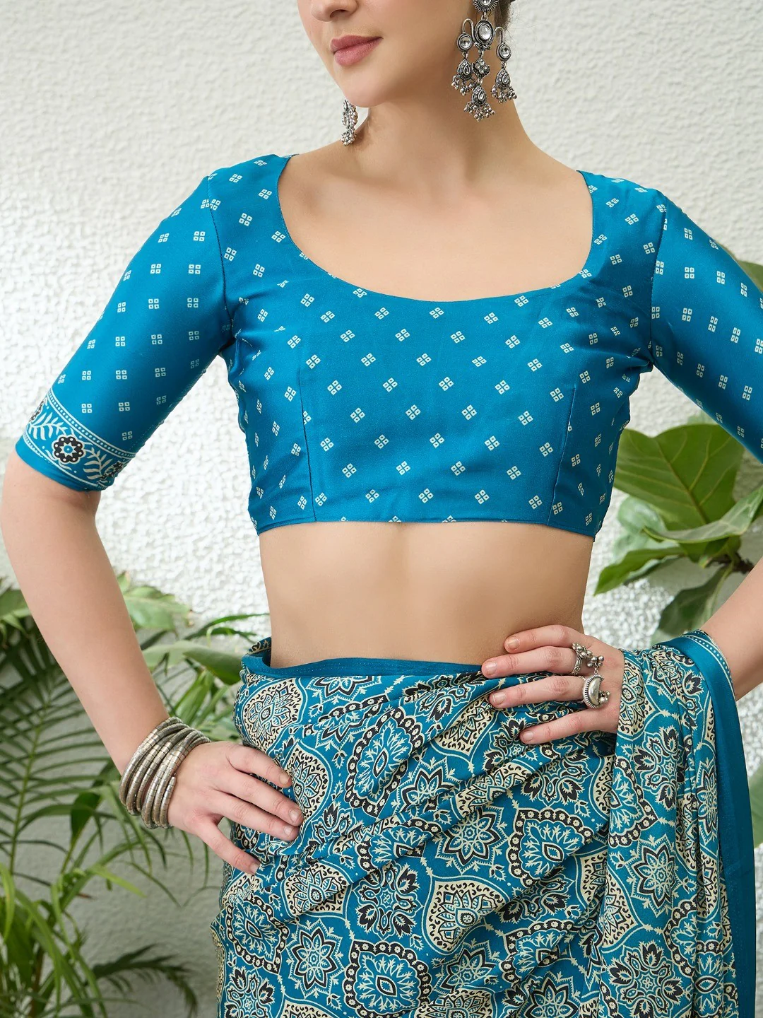 Charming Teal Blue Floral Printed Satin Saree Beautified With Decorative Latkan Pallu - Image 5