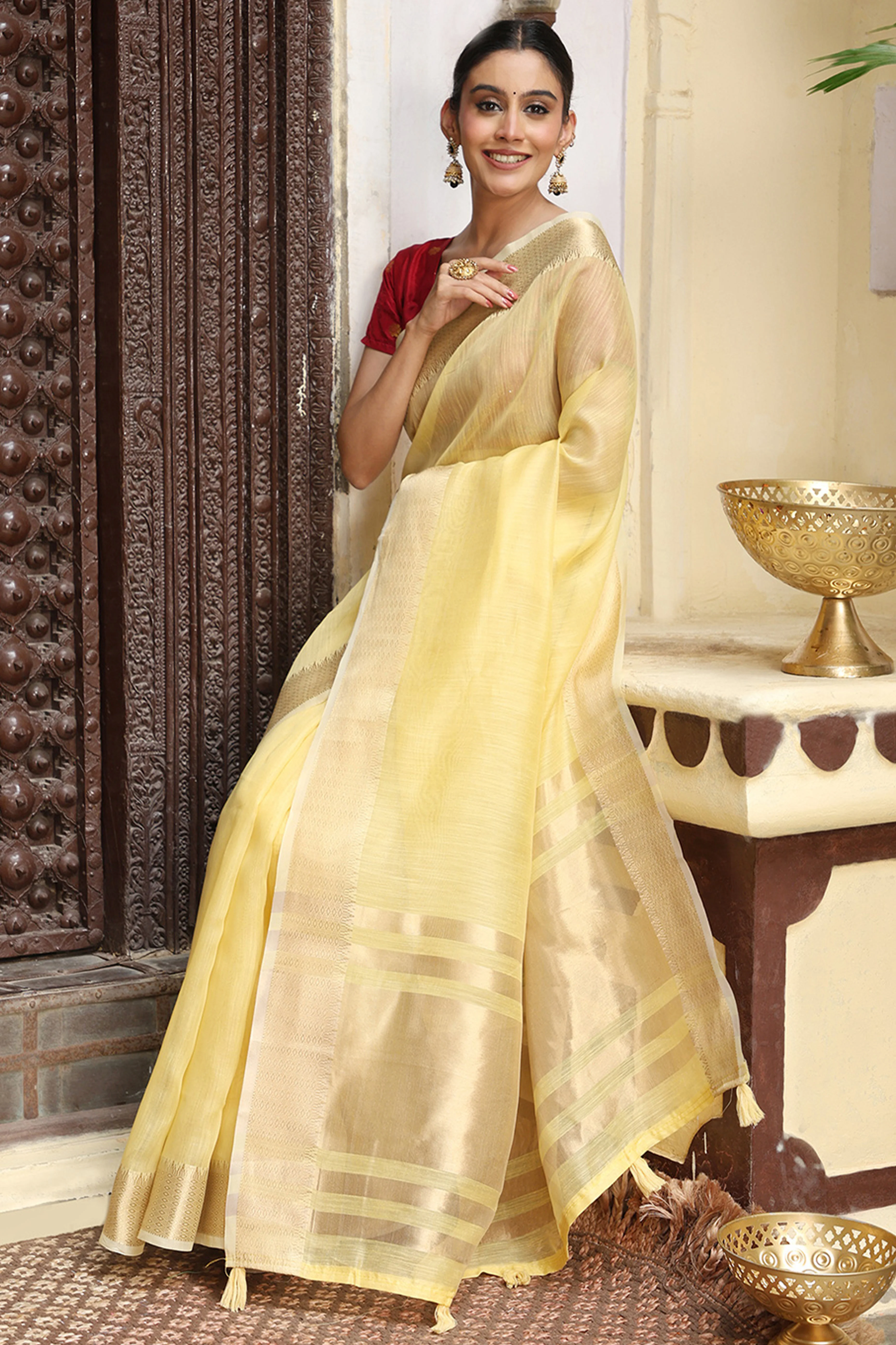 Charming Yellow Zari Weaving Cotton Blend Saree Adorned With Stylish Tassel Detailing - Image 4