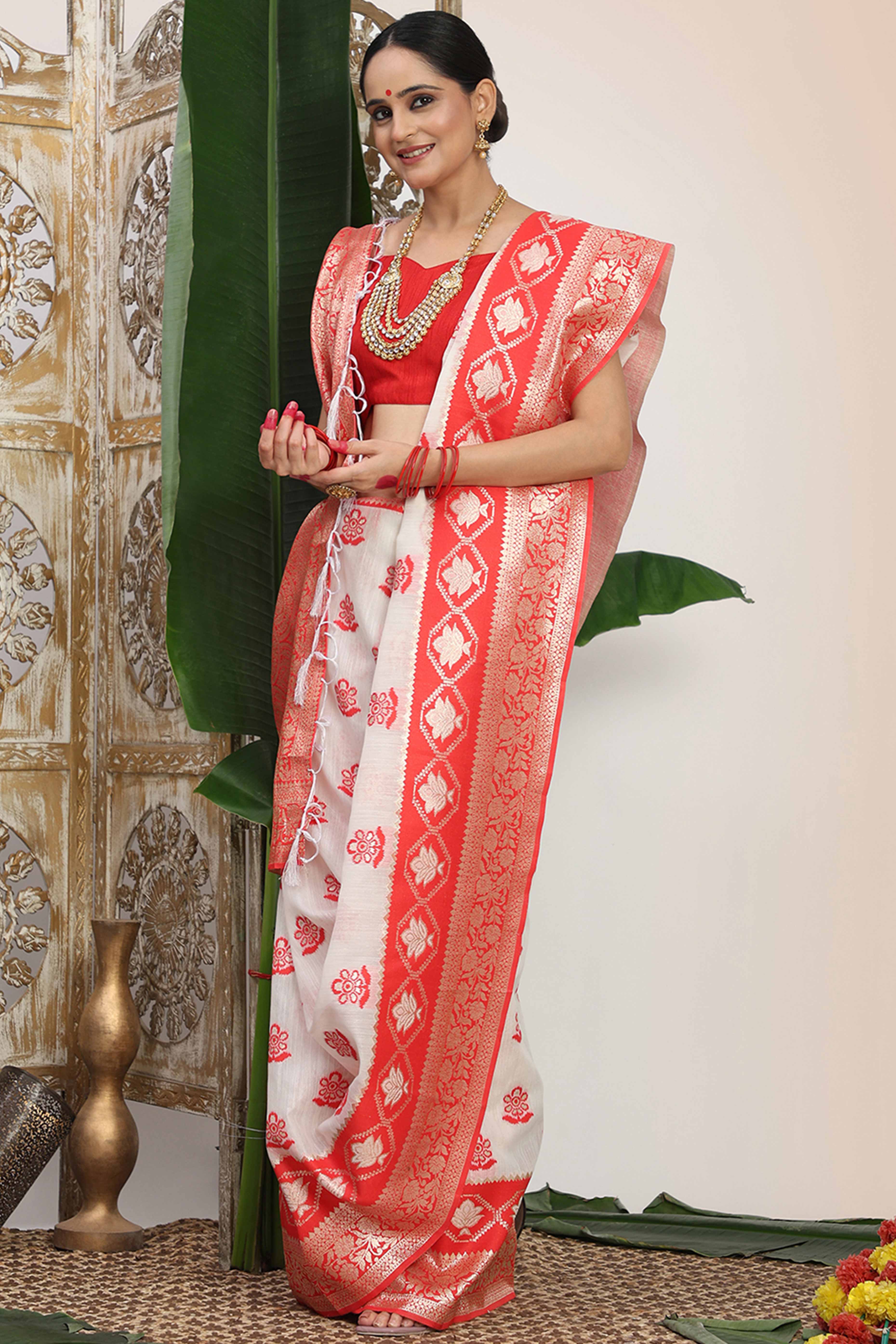 Chic White & Red  Saree In Linen Cotton Flaunting Traditional Zari Weaving And A Tasselled Edge - Image 4