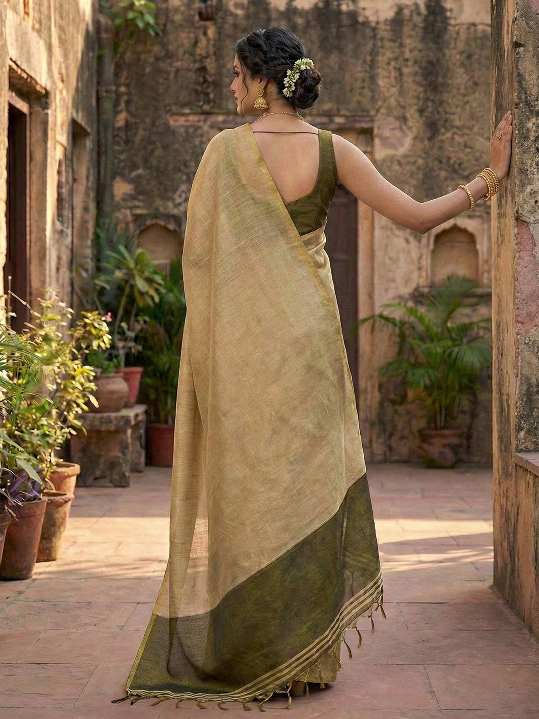 Classic Cream Solid Tissue Silk Saree Featuring Intricate Zari Weaving & Tassel Pallu - Image 2