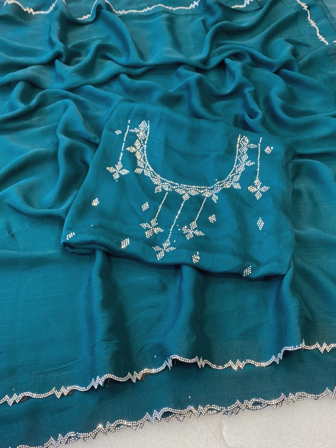 Classic Peacock Blue Solid Chiffon Saree Featuring Subtle Stone Work Border Detailing - Image 4