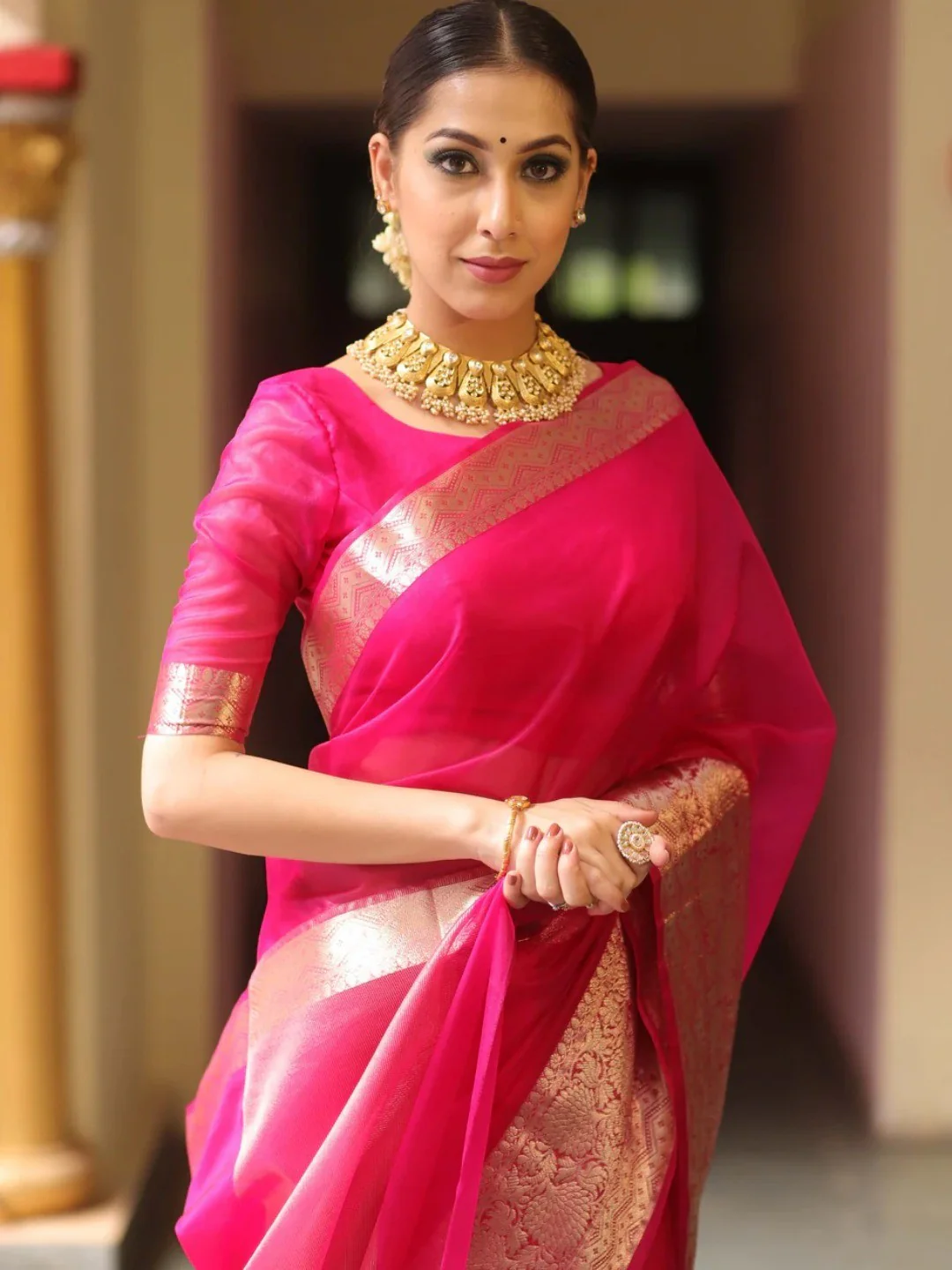 Classic Rani Pink Solid Organza Saree Featuring Floral Golden Zari Weaving Border - Image 4