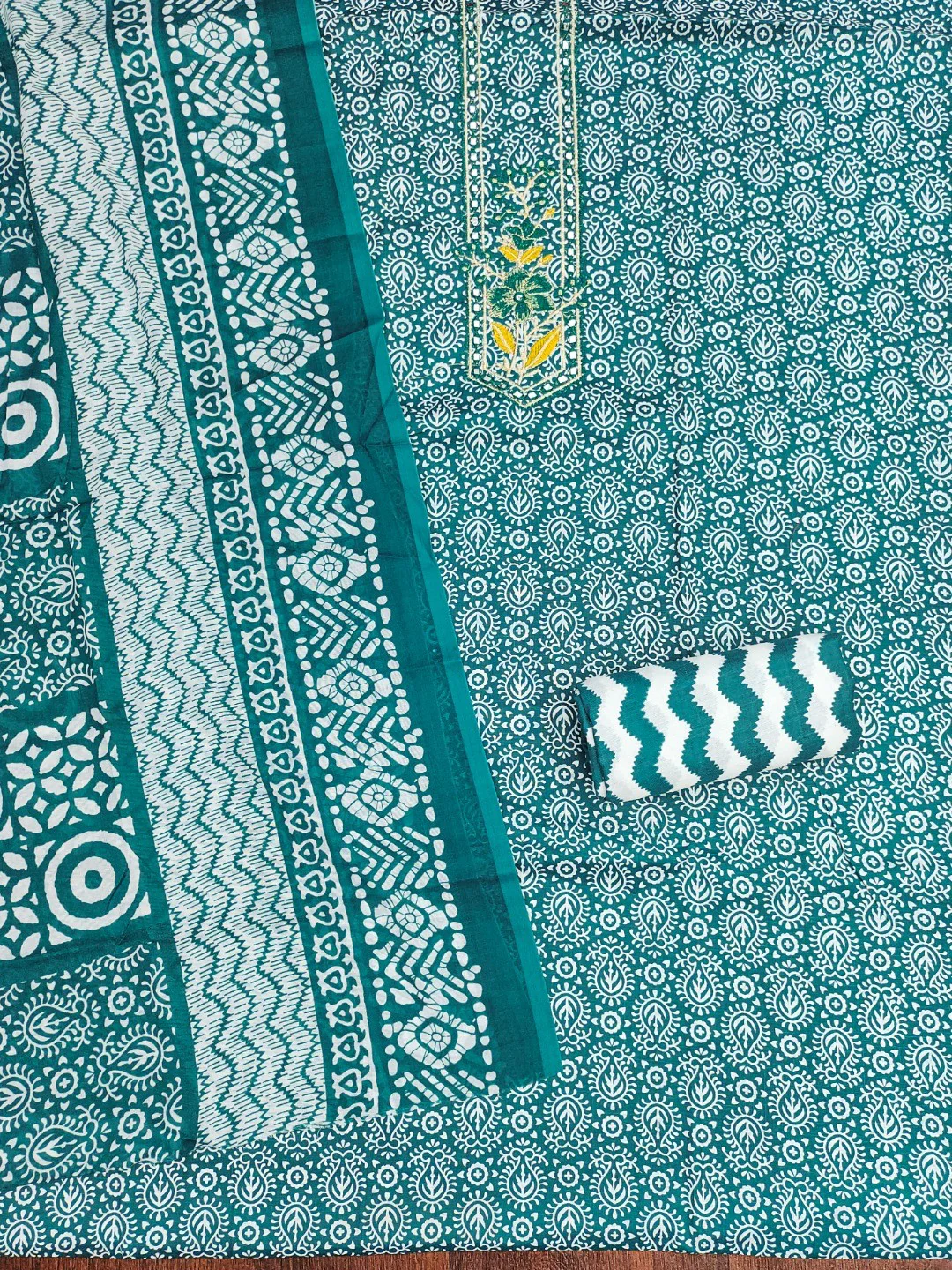 Classic Teal Printed Cotton Blend Dress Material Highlighted With Delicate Floral Embroidery On Neck - Image 3