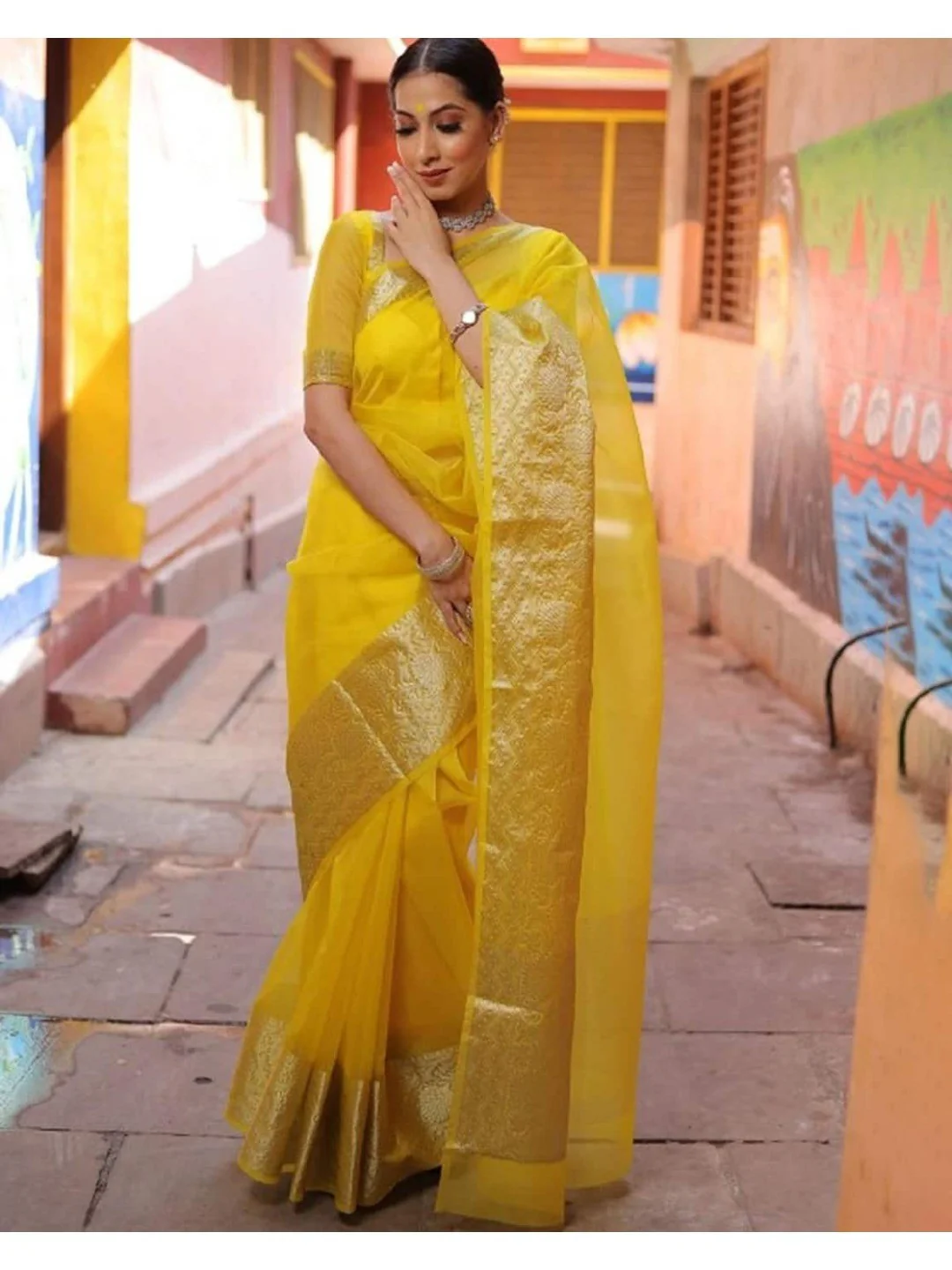 Classic Yellow Solid Organza Saree Featuring Floral Golden Zari Weaving Border - Image 6