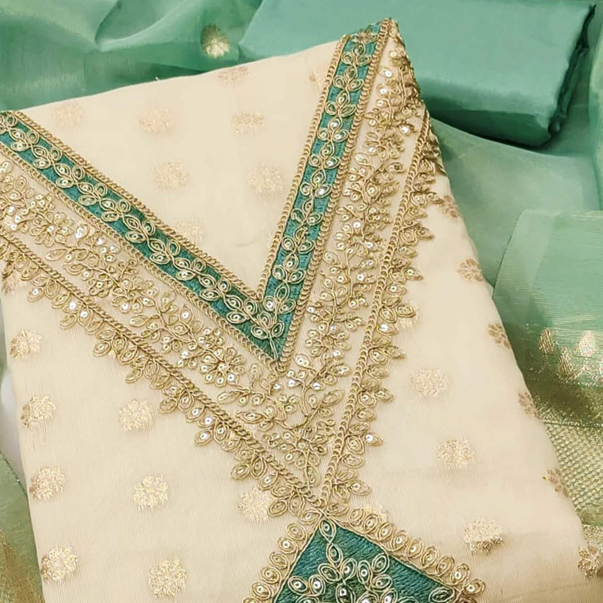 Cream & Green Shimmer Featuring Floral Butti Weaving With Cording Embroidered Dress Material - Image 2