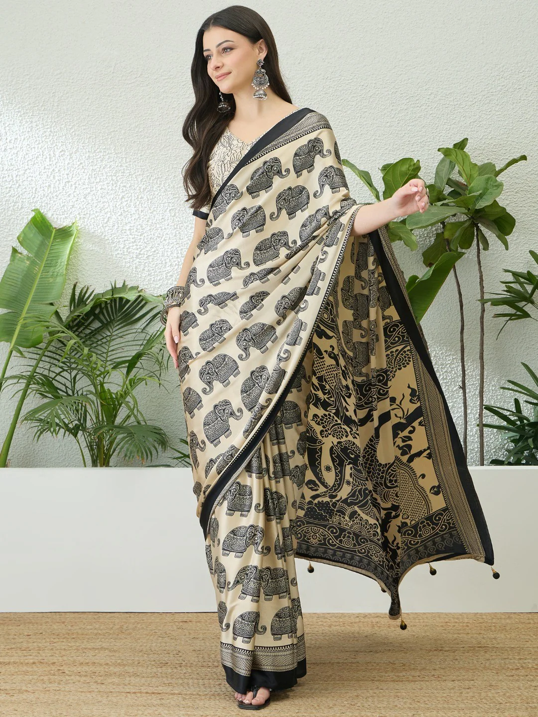 Cream Satin Saree with Elephant Print and Black Border