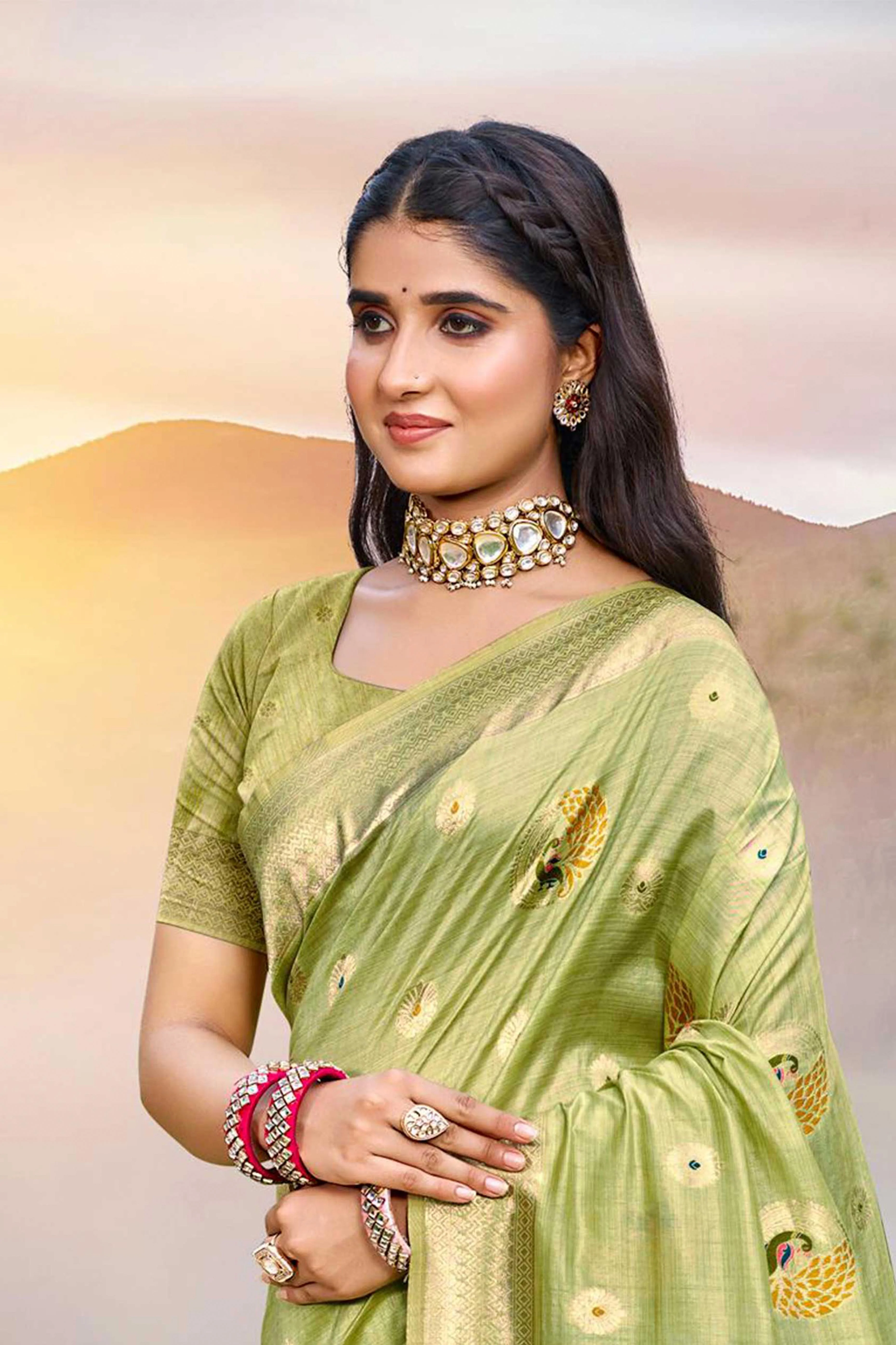 Designer Green Assam Silk Blend Saree Adorned With Peacock Zari Weaving & Tassel Pallu - Image 3