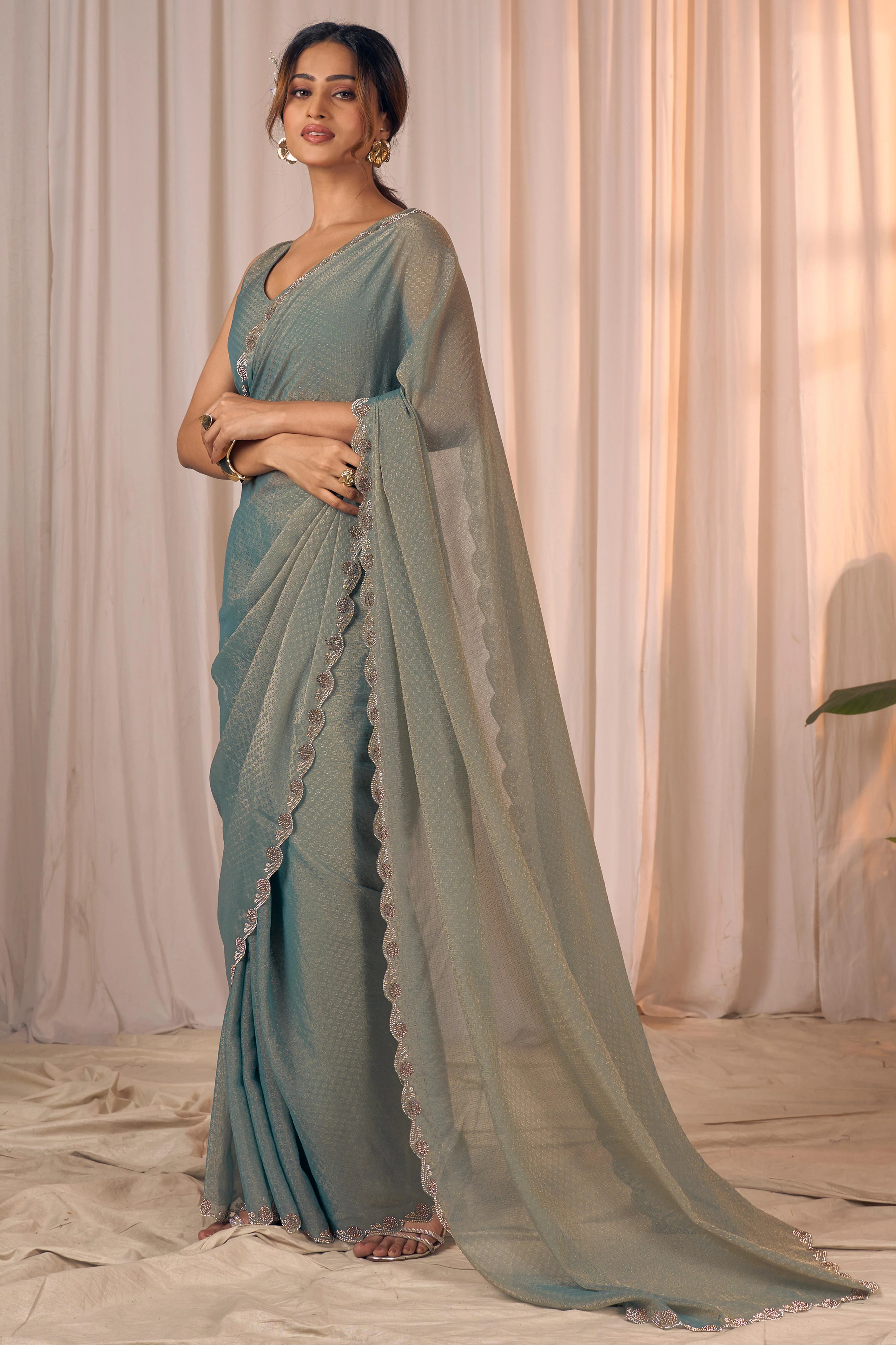 Designer Sage Green Georgette Saree Adorned With An Elegant Zarkan Cutwork Border - Image 4
