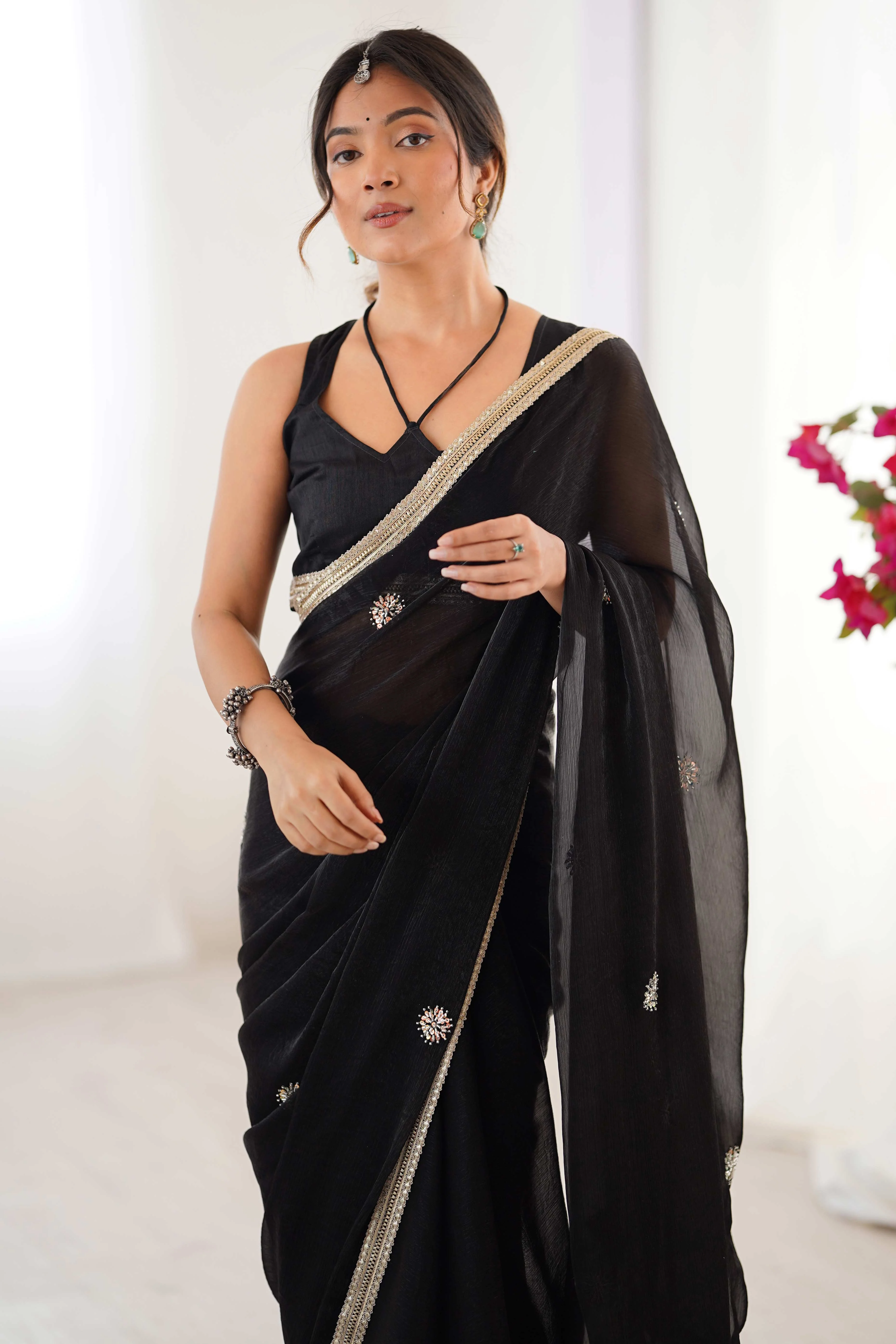 Elegant Black Organza Saree with Delicate Floral Embellishments and Lace Border - Image 9