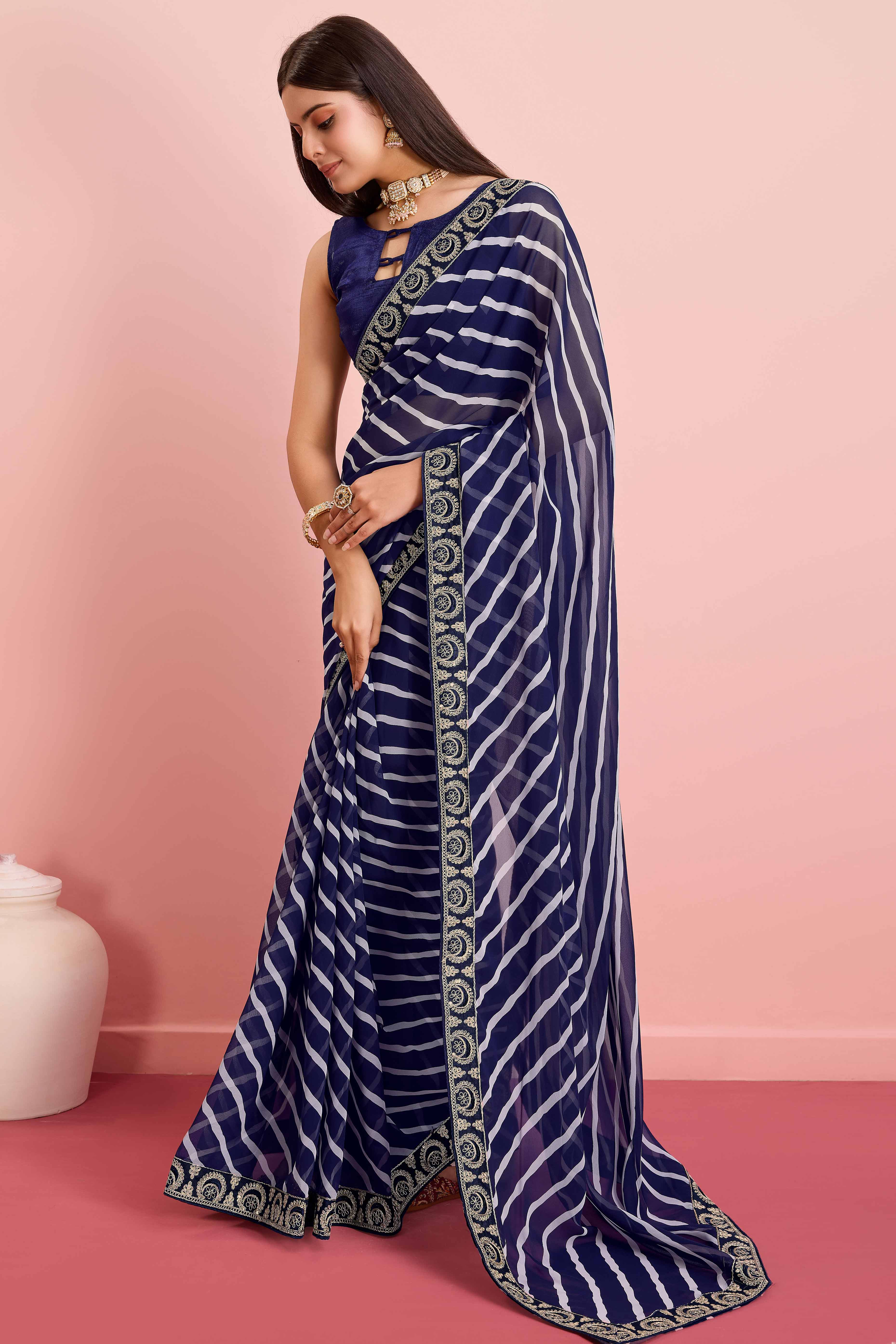 Elegant Blue Leheriya Printed Saree in Flowing Georgette - Image 3