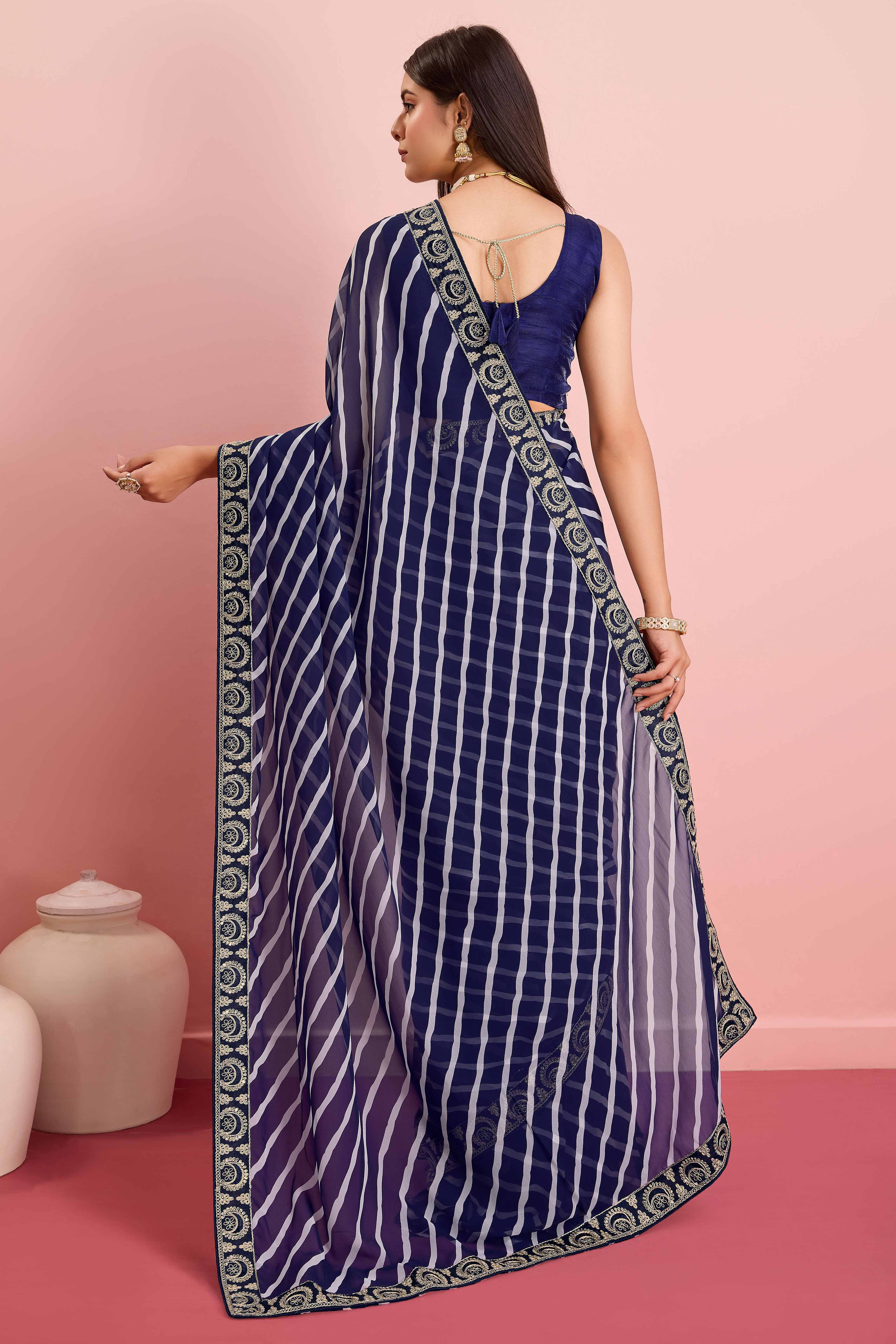 Elegant Blue Leheriya Printed Saree in Flowing Georgette - Image 4