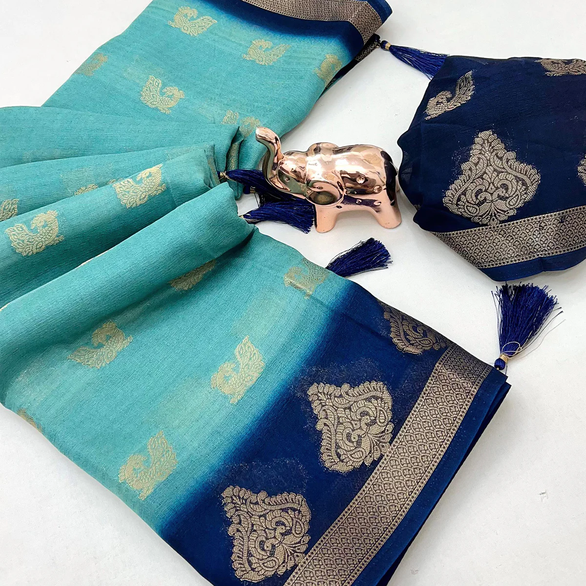 Elegant Blue Peacock Pattern Zari Weaving Georgette Saree With Tassel Pallu - Image 2