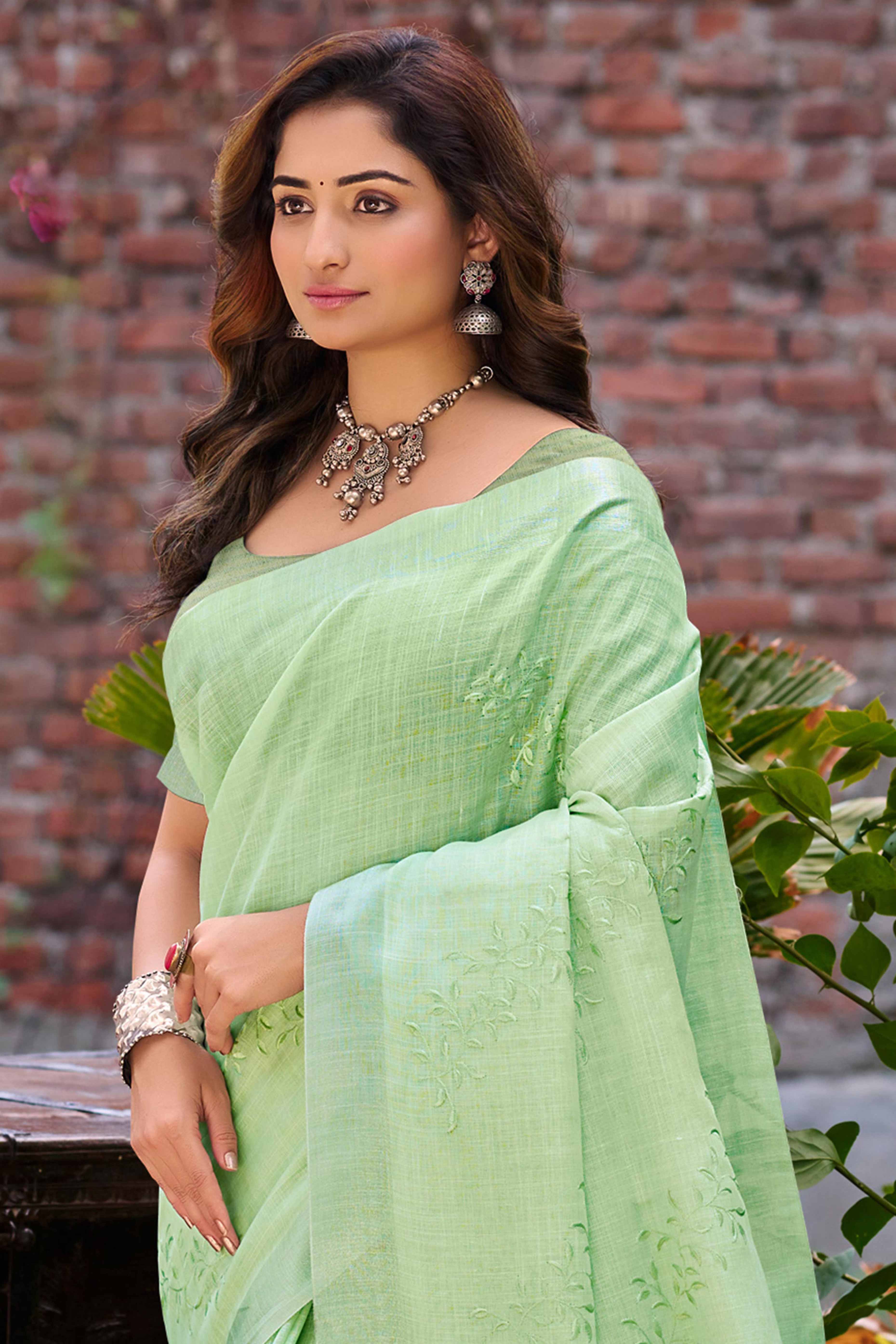 Elegant Green Linen Saree Featuring Intricate Woven & Embroidered Patterns - Image 3