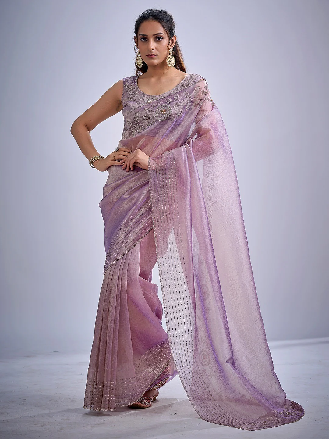 Elegant Lavender Kanjivaram Silk Saree Adorned With Stone Work & Cut Dana Detailing
