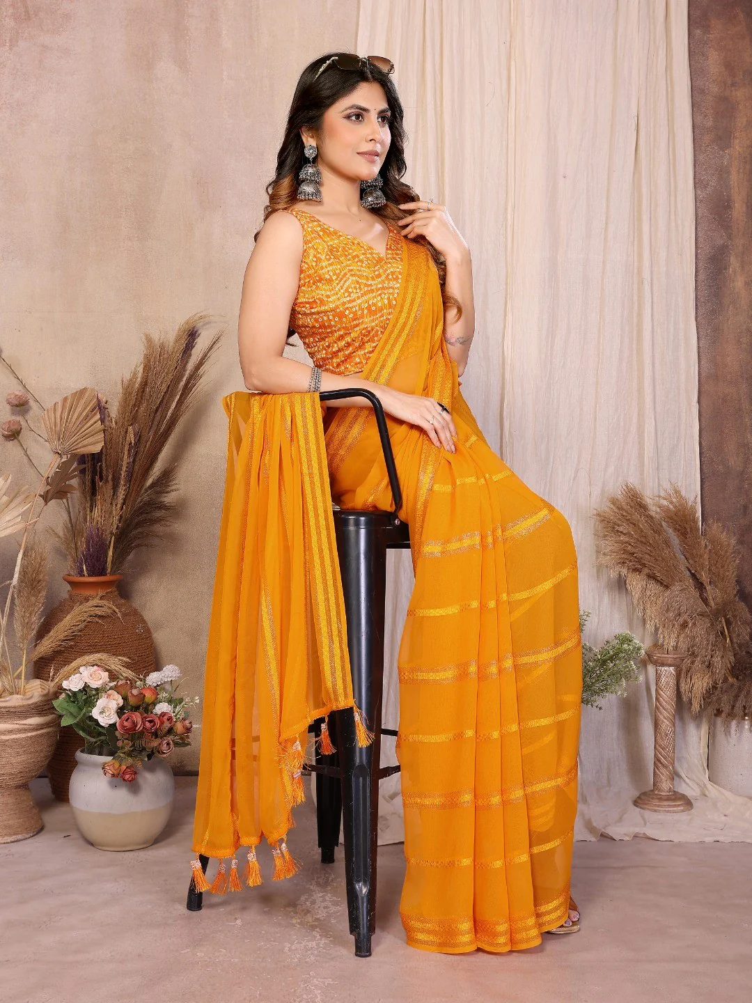 Elegant Mustard Zari Striped Weaving Georgette Saree Highlighted With Tassel Pallu - Image 3
