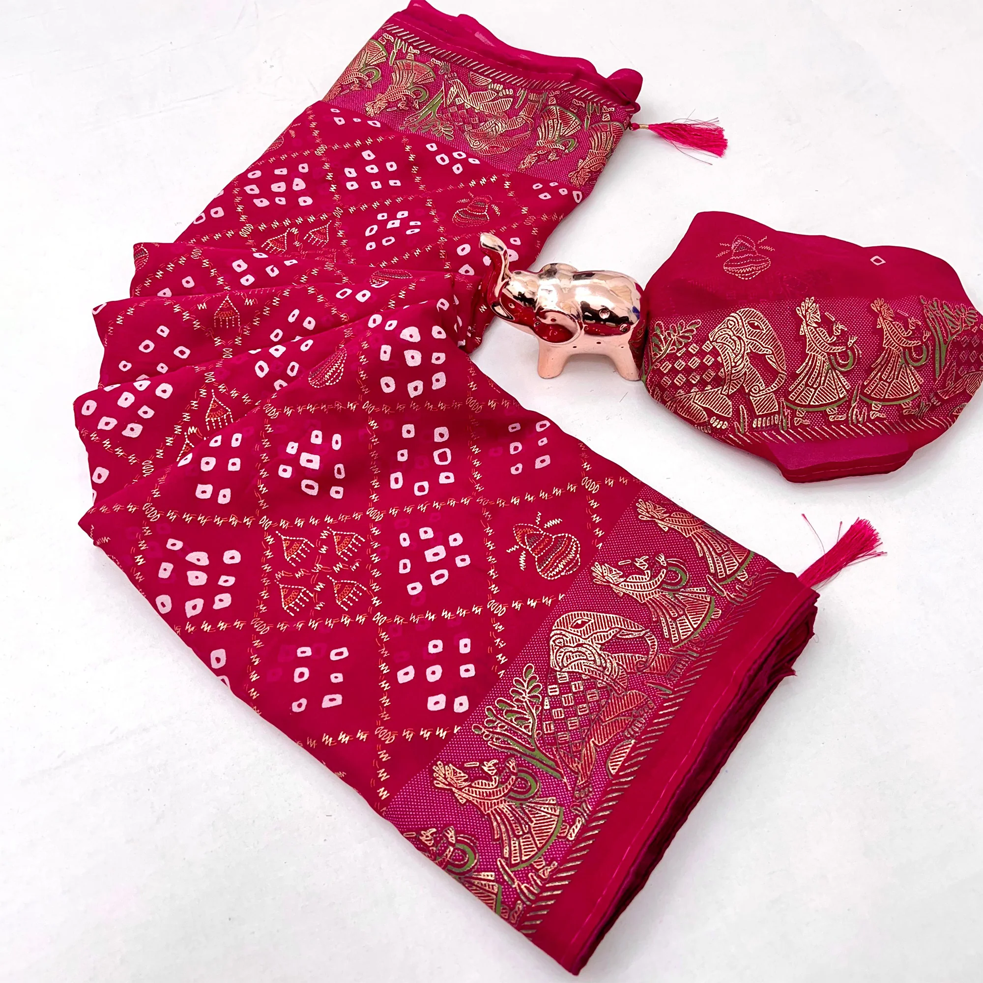 Elegant Pink Bandhani Foil Printed Georgette Saree Highlighted With Soft Tassel Pallu