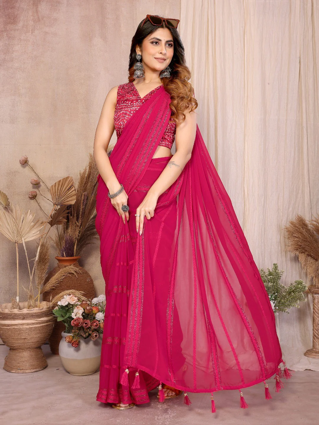 Elegant Pink Zari Striped Weaving Georgette Saree Highlighted With Tassel Pallu - Image 3