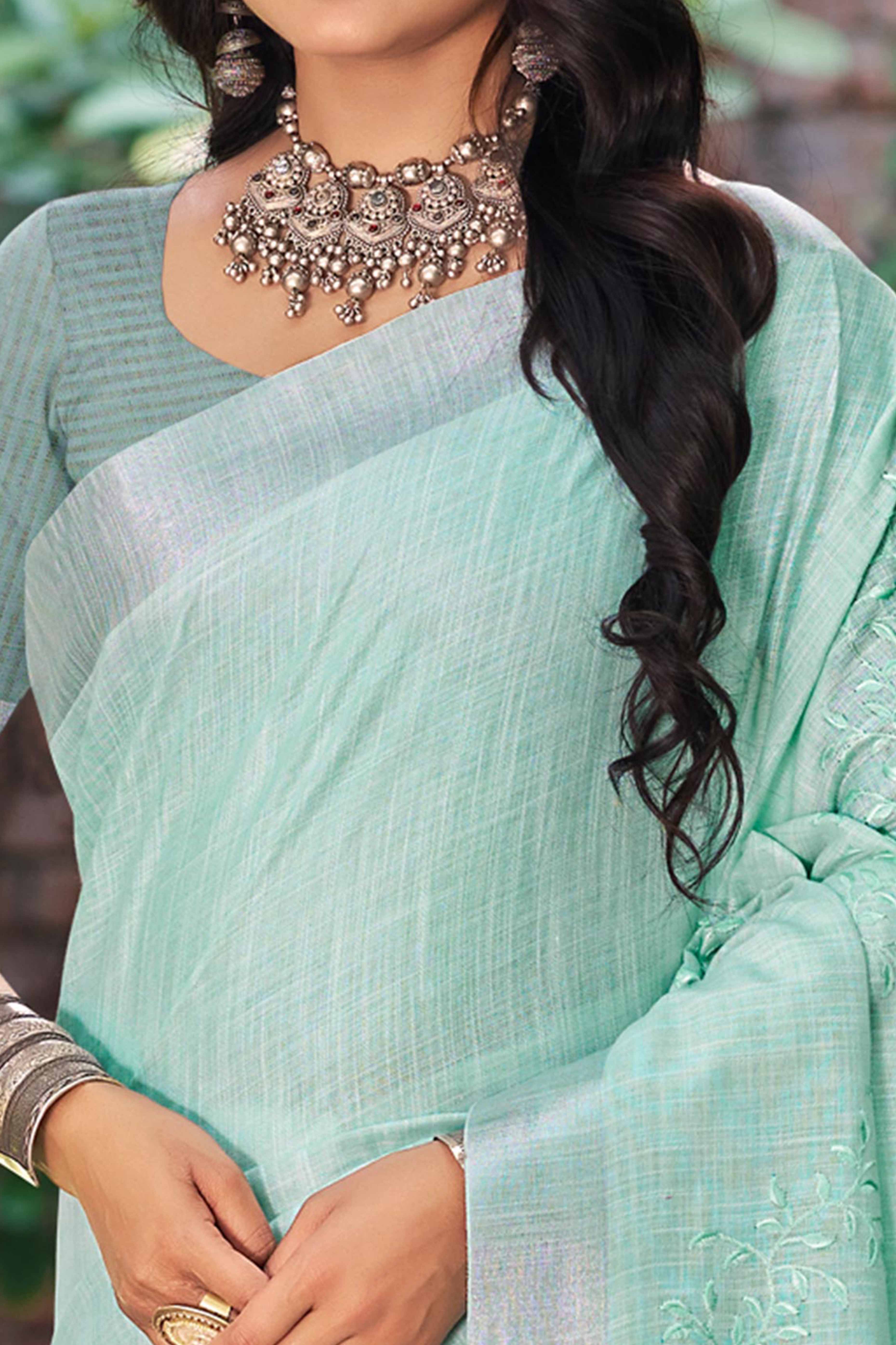 Elegant Sea Green Linen Saree Featuring Intricate Woven & Embroidered Patterns - Image 2