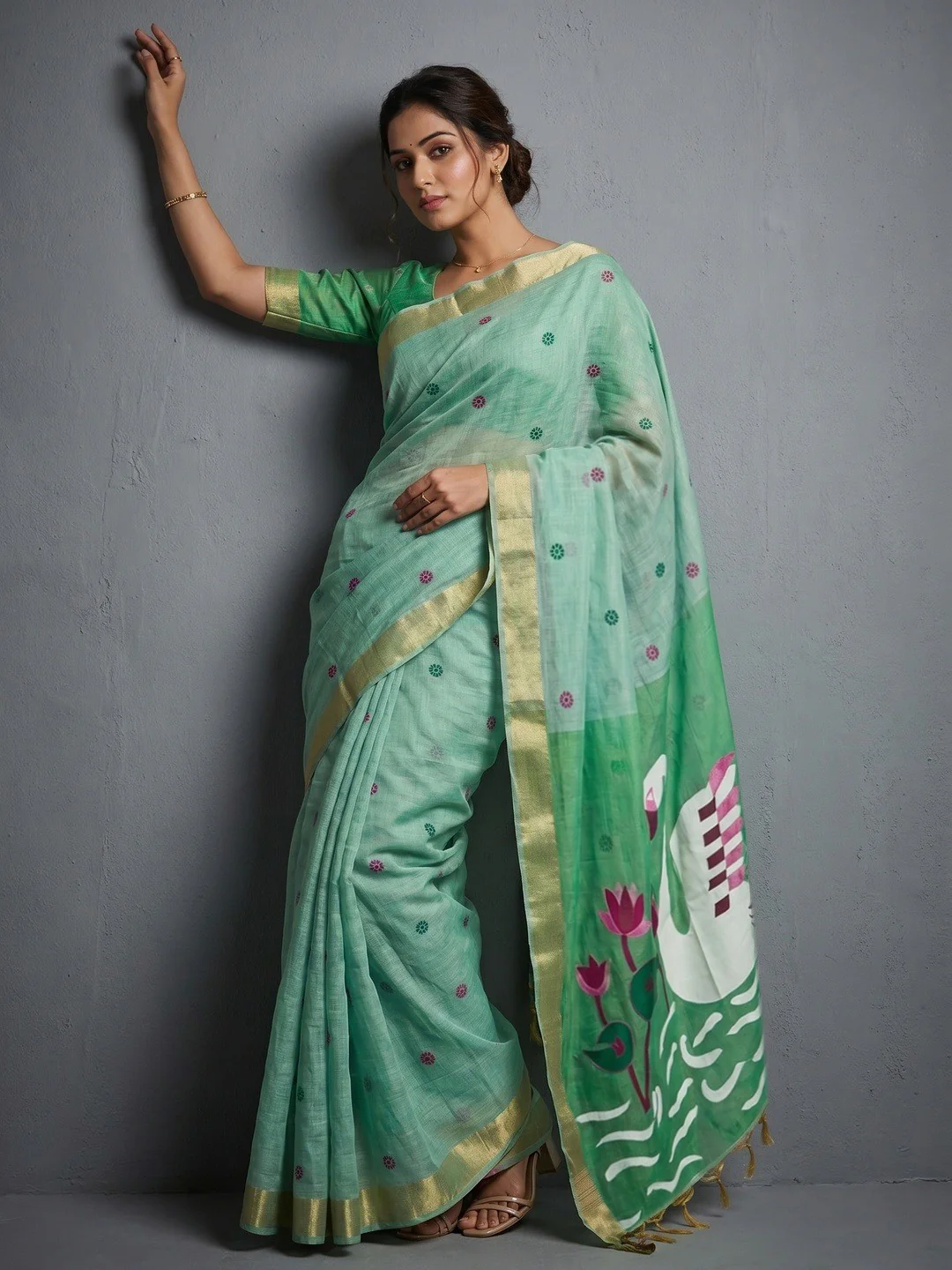 Elegant Sea Green Linen Saree with Floral Prints and Swan Motif Pallu