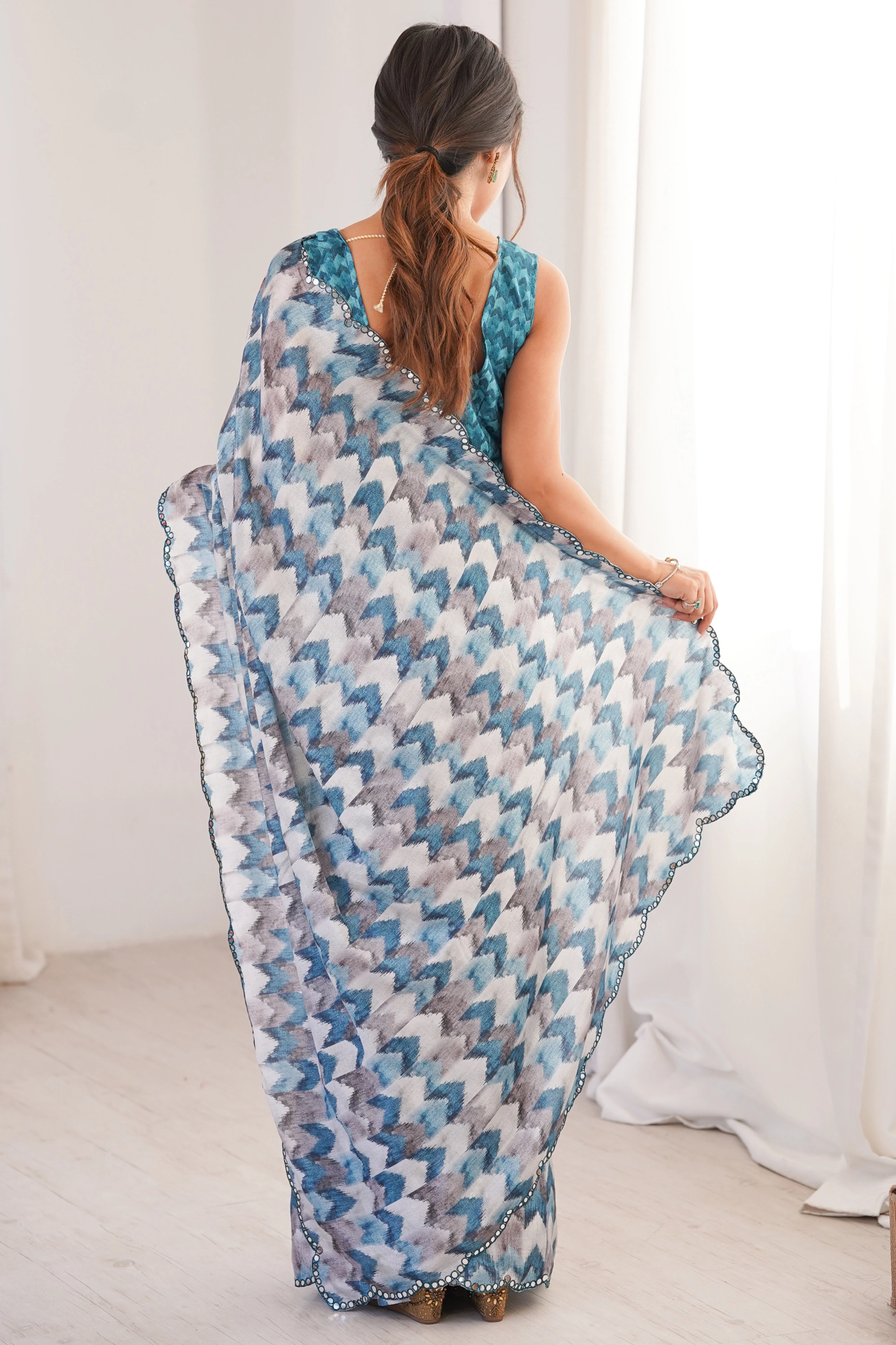Elegant White Floral Digital Printed Chinon Saree Accented With Intricate Embroidered Border - Image 6