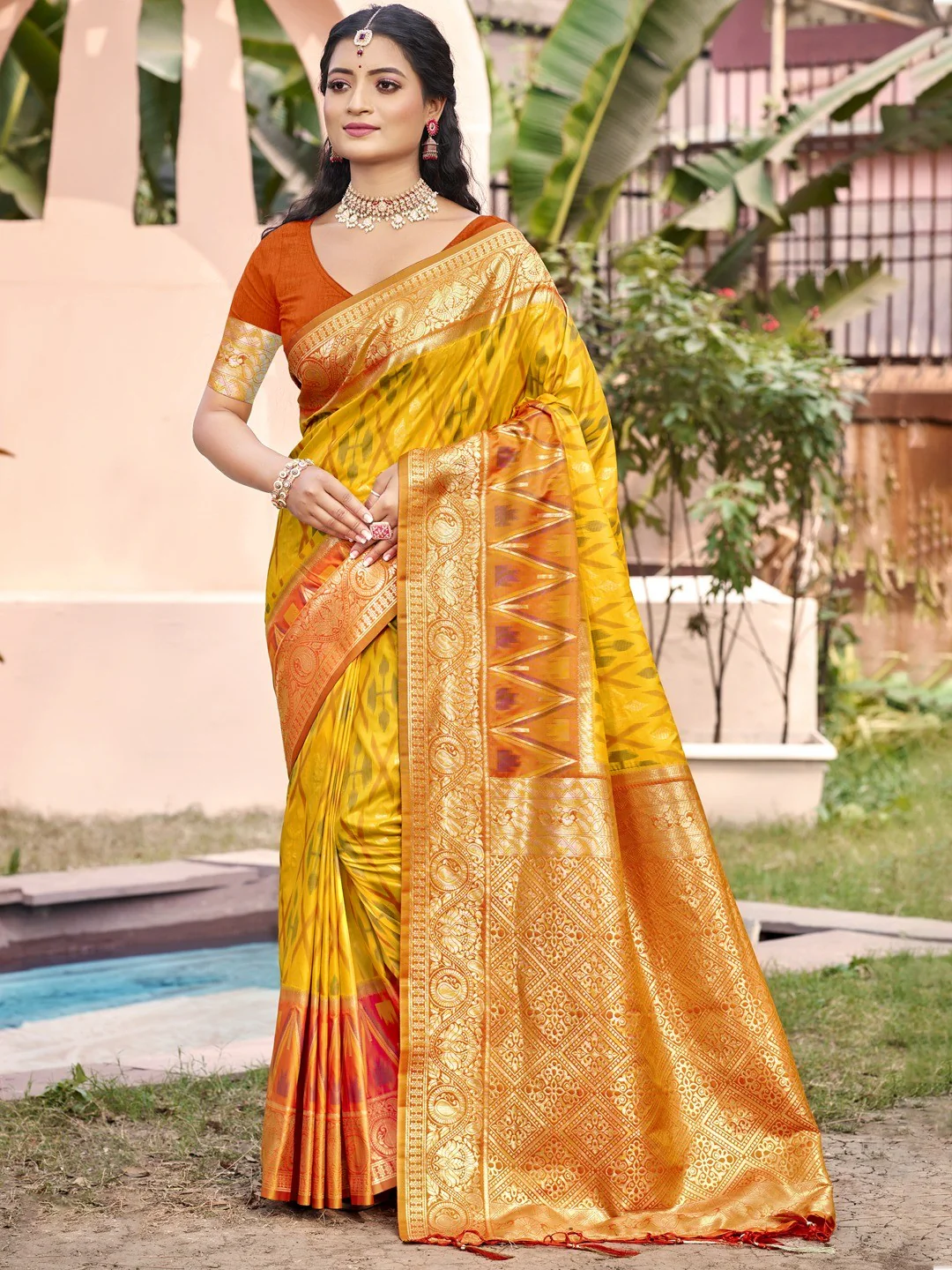 Elegant Yellow Ikkat Print Woven Silk Blend Saree with Golden Border
