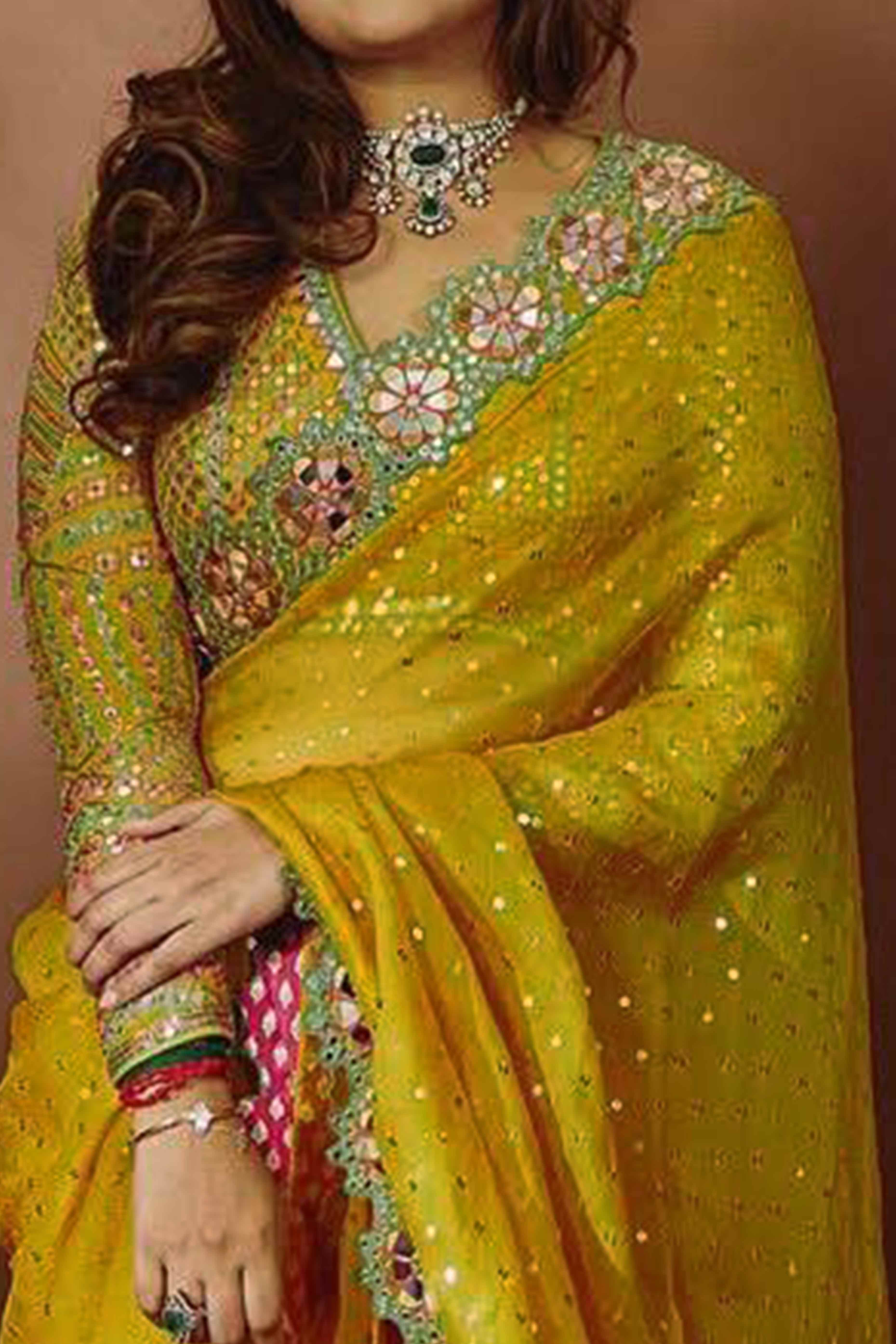 Embroidered Mustard Georgette Saree with Shimmering Mirror Accents - Image 2
