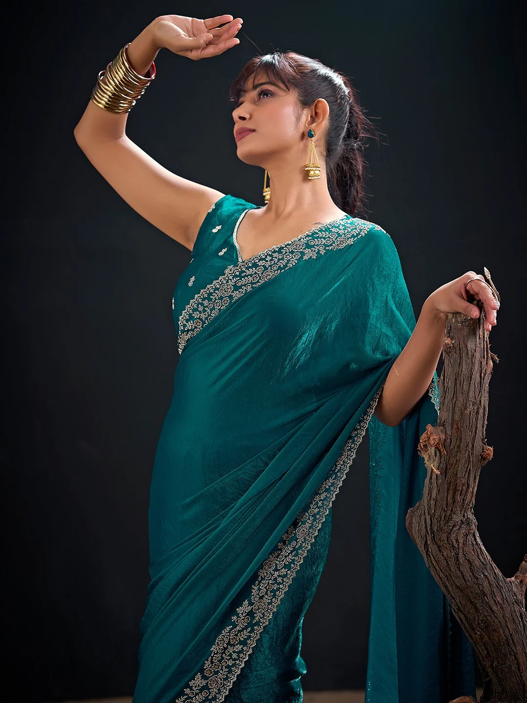 Glamorous Teal Solid Satin Silk Saree Adorned With Floral Stone Embellished Border - Image 5