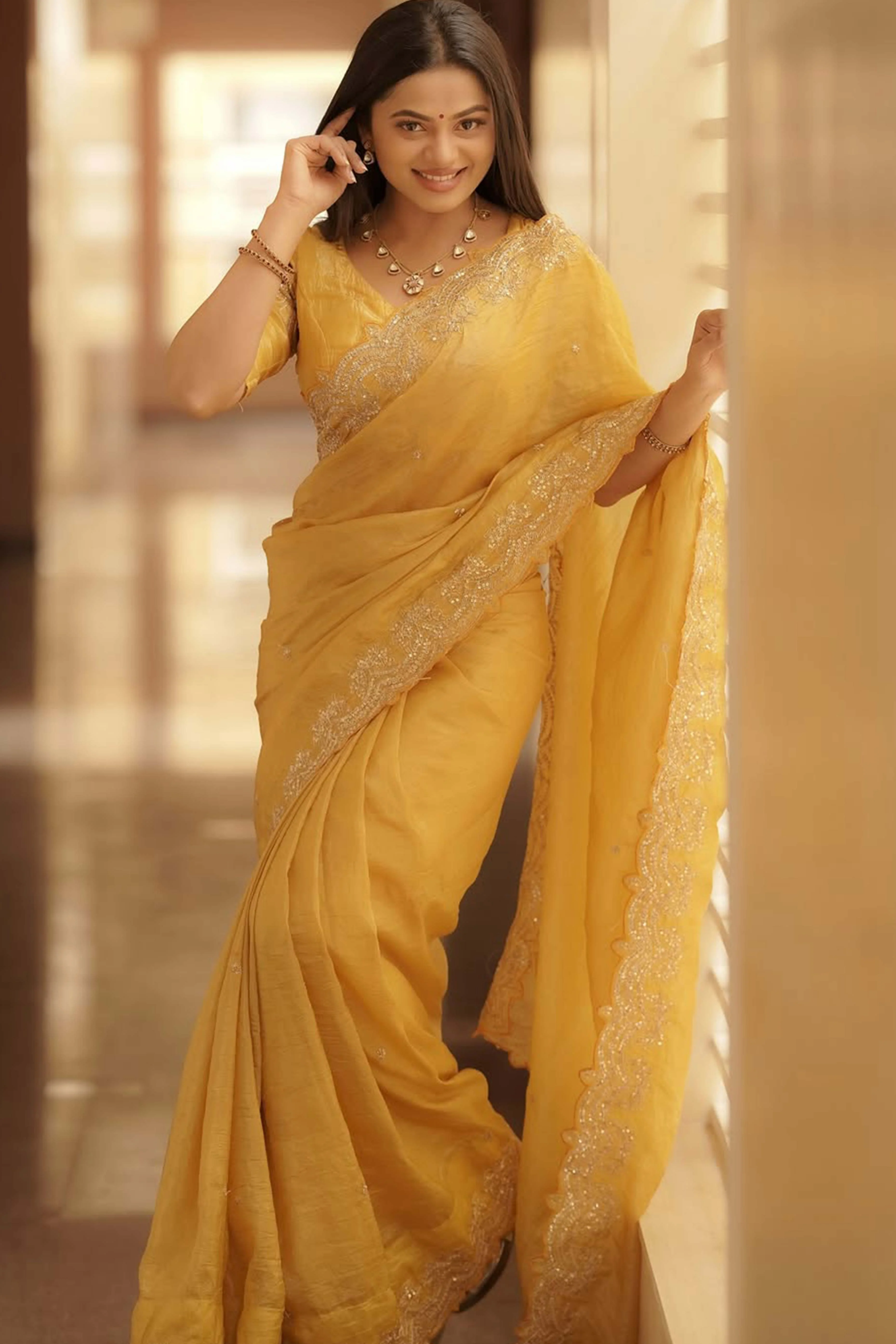 Golden Silk Blend Saree Accented with Sparkling Sequin Embellished