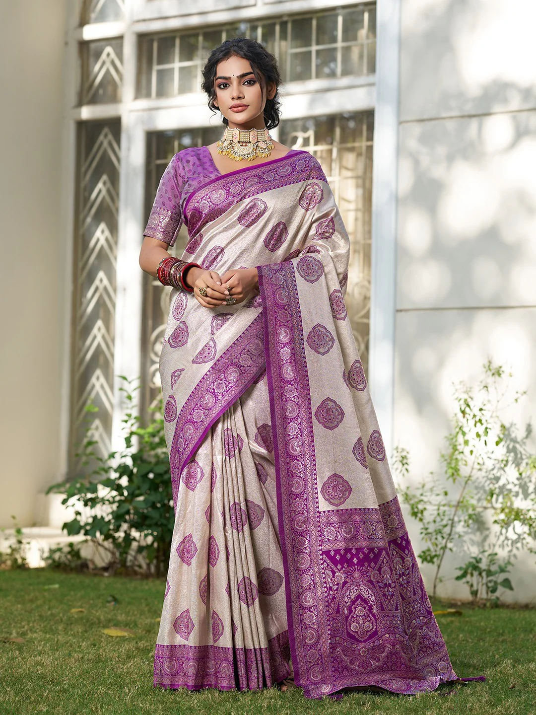 Graceful Cream & Purple Floral Weaving Silk Blend Saree Enhanced With Designer Tassel Pallu