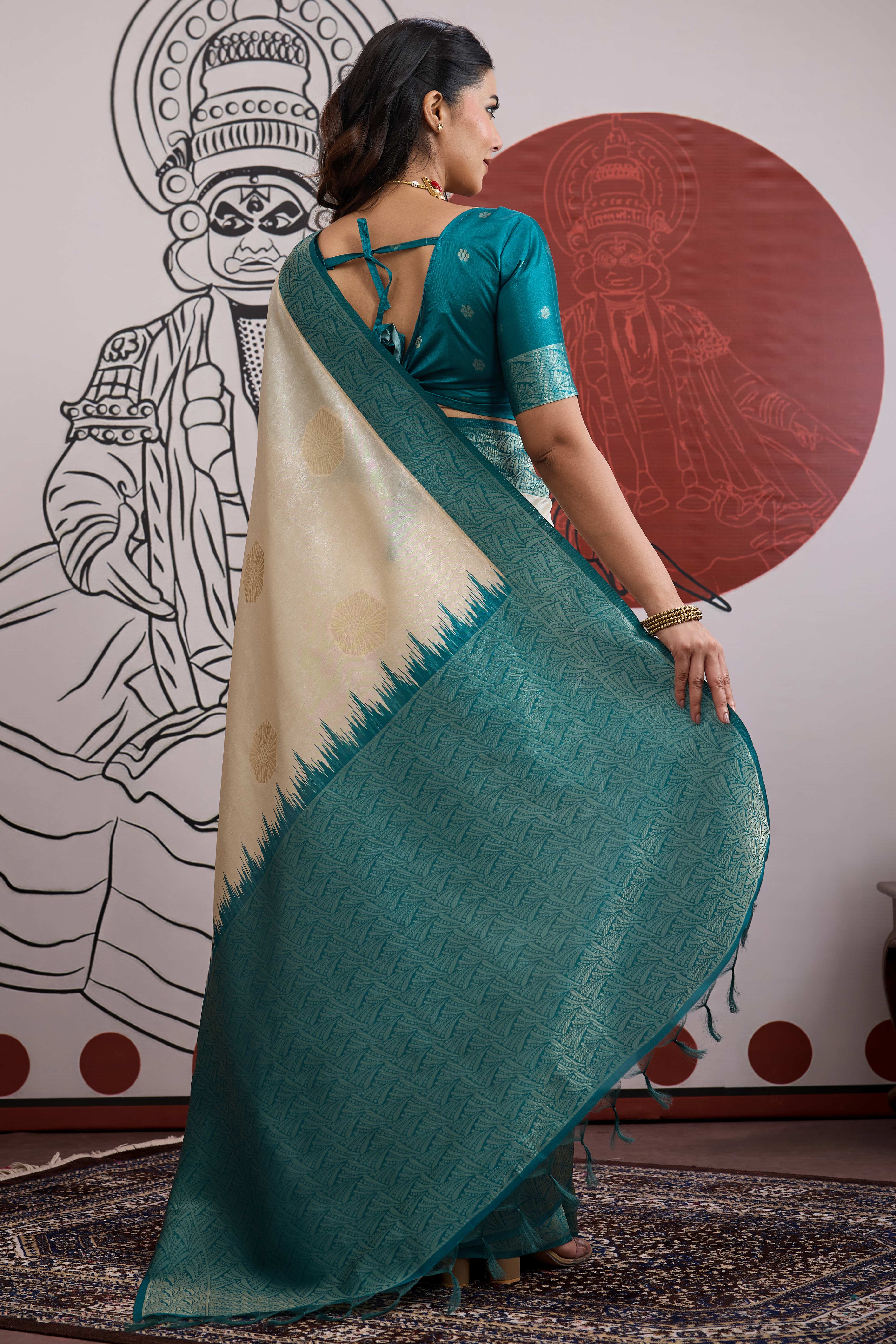 Graceful Cream & Teal Zari Weaving Silk Saree Highlighted By Decorative Tassel Pallu - Image 5