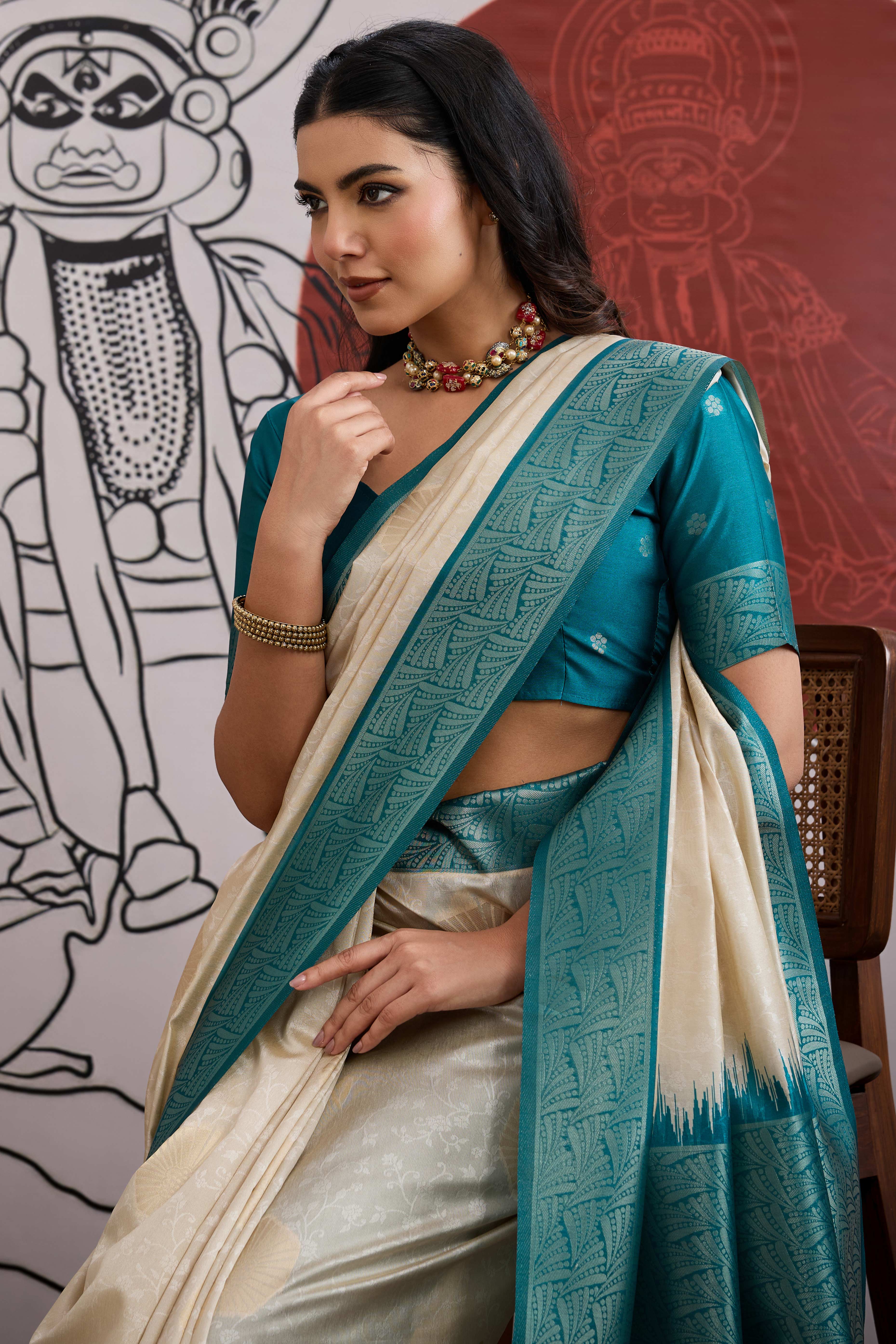 Graceful Cream & Teal Zari Weaving Silk Saree Highlighted By Decorative Tassel Pallu - Image 6