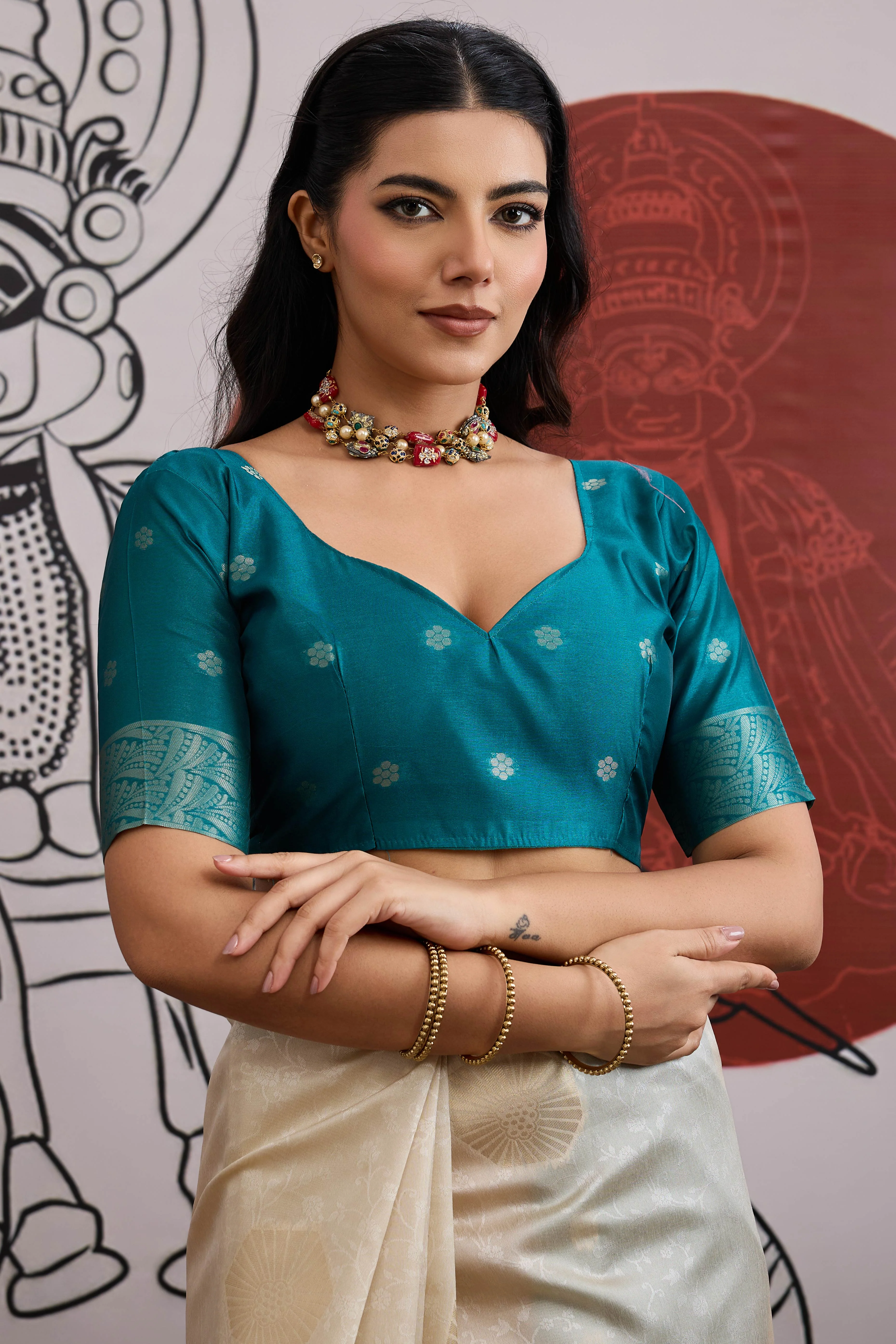 Graceful Cream & Teal Zari Weaving Silk Saree Highlighted By Decorative Tassel Pallu - Image 7