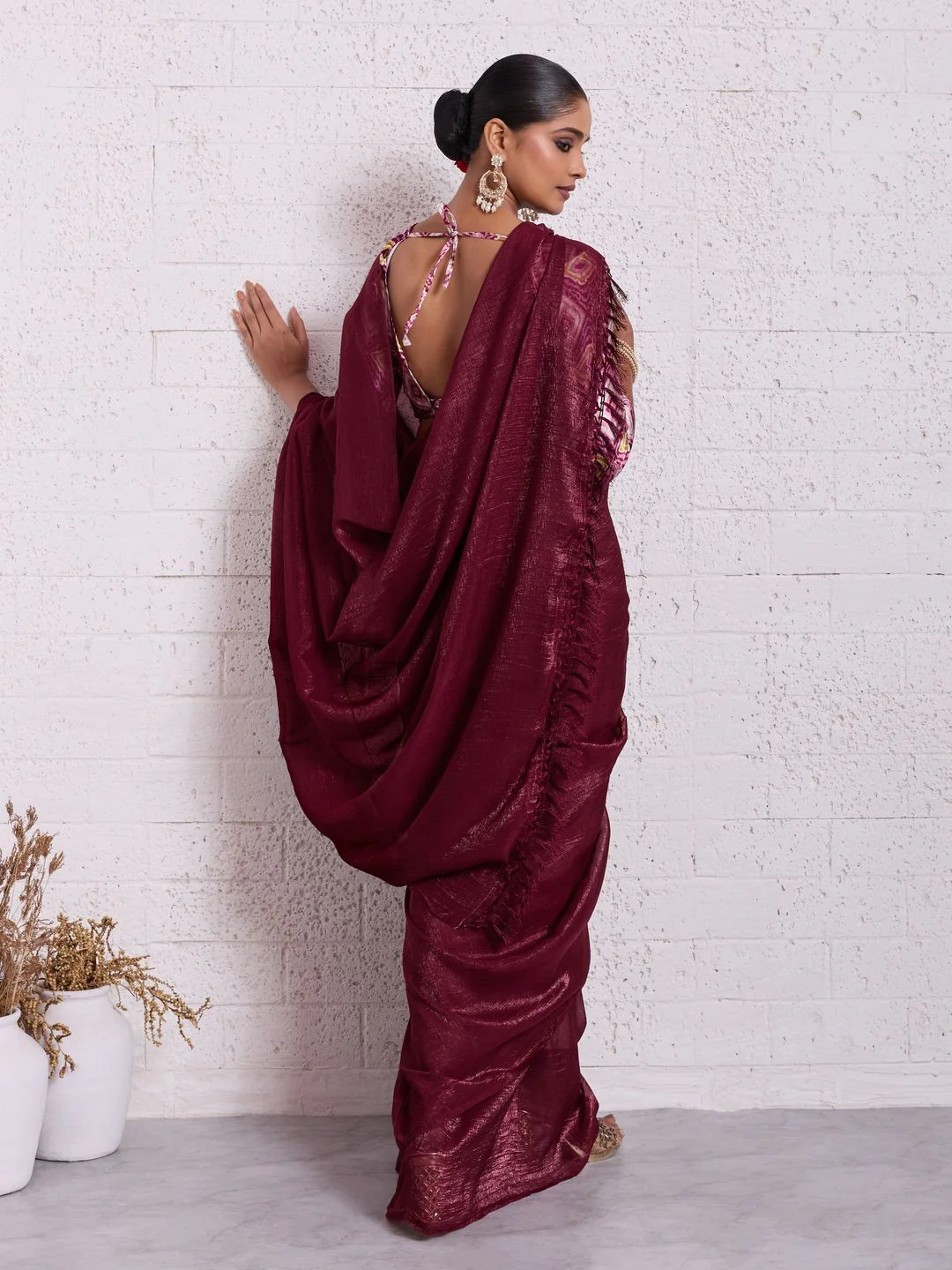 Graceful Dark Maroon Solid Pure Crunchy Saree Accented With Fine Tassel Pallu - Image 5