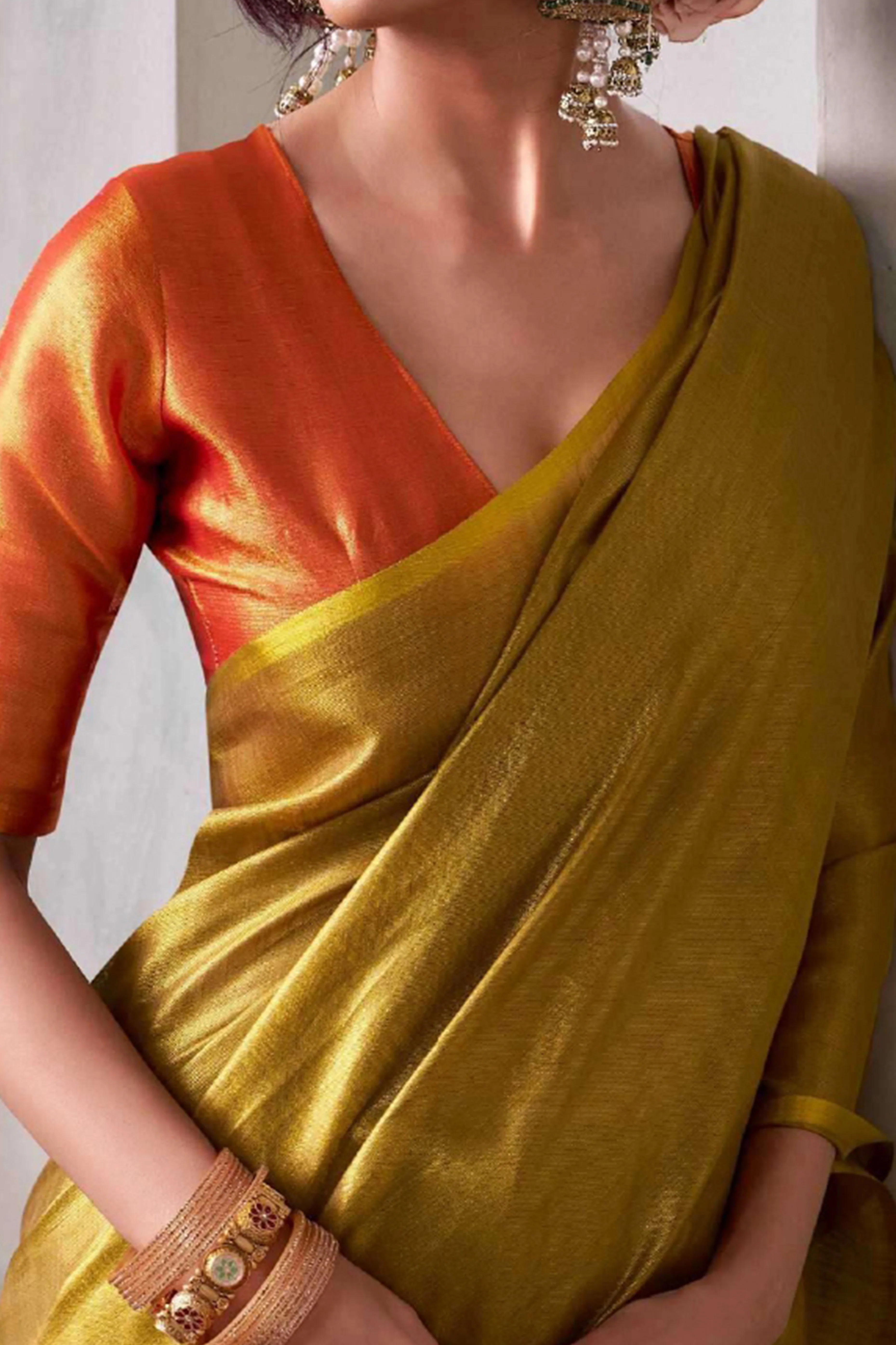 Graceful Dark Mustard Tissue Silk Blend Saree Adorned with Intricate Zari Weaving & Tassel Pallu - Image 2