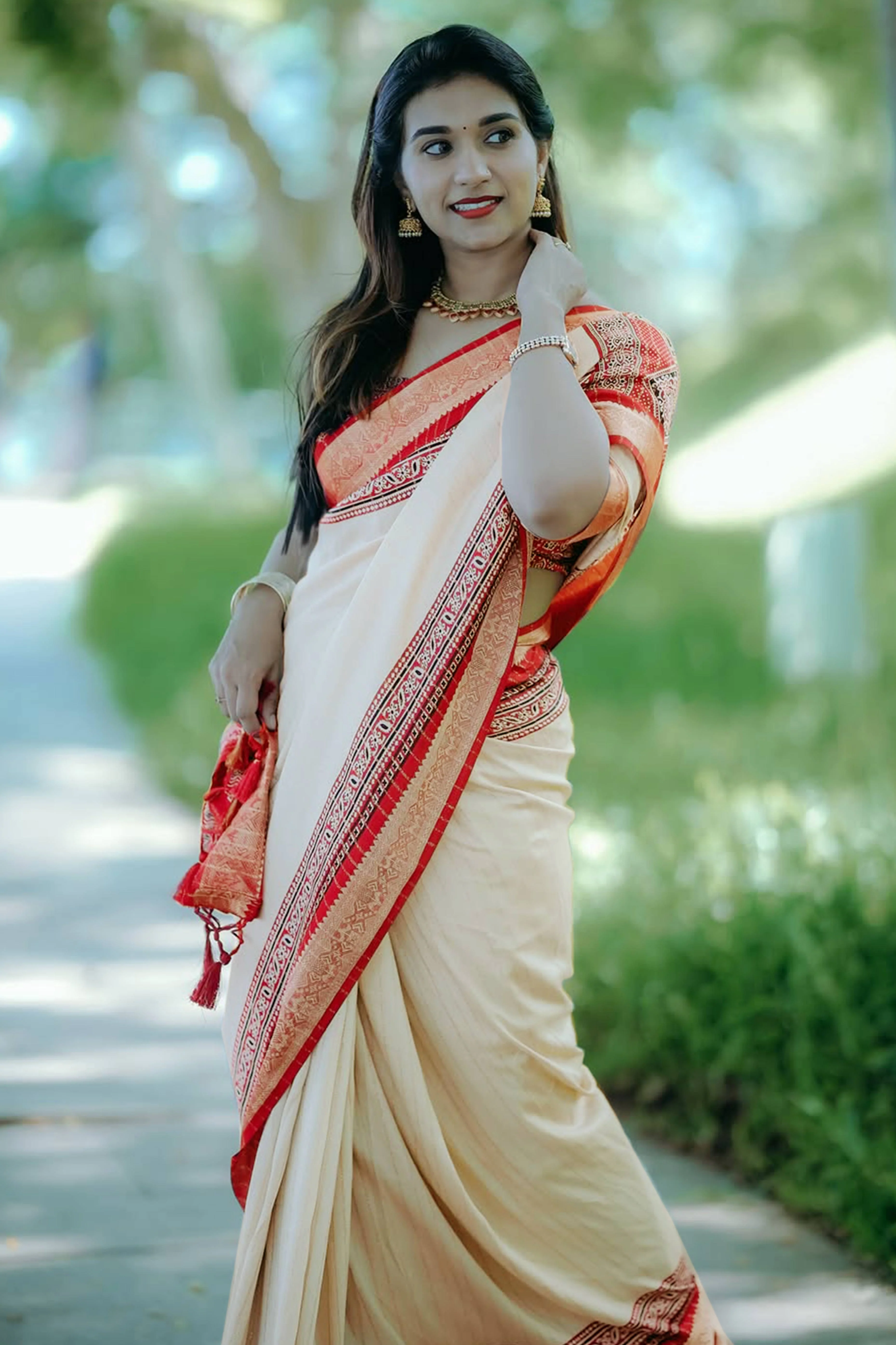 Graceful Light Chikoo Dola Silk Saree Featuring Striped Weave & Floral Border - Image 4